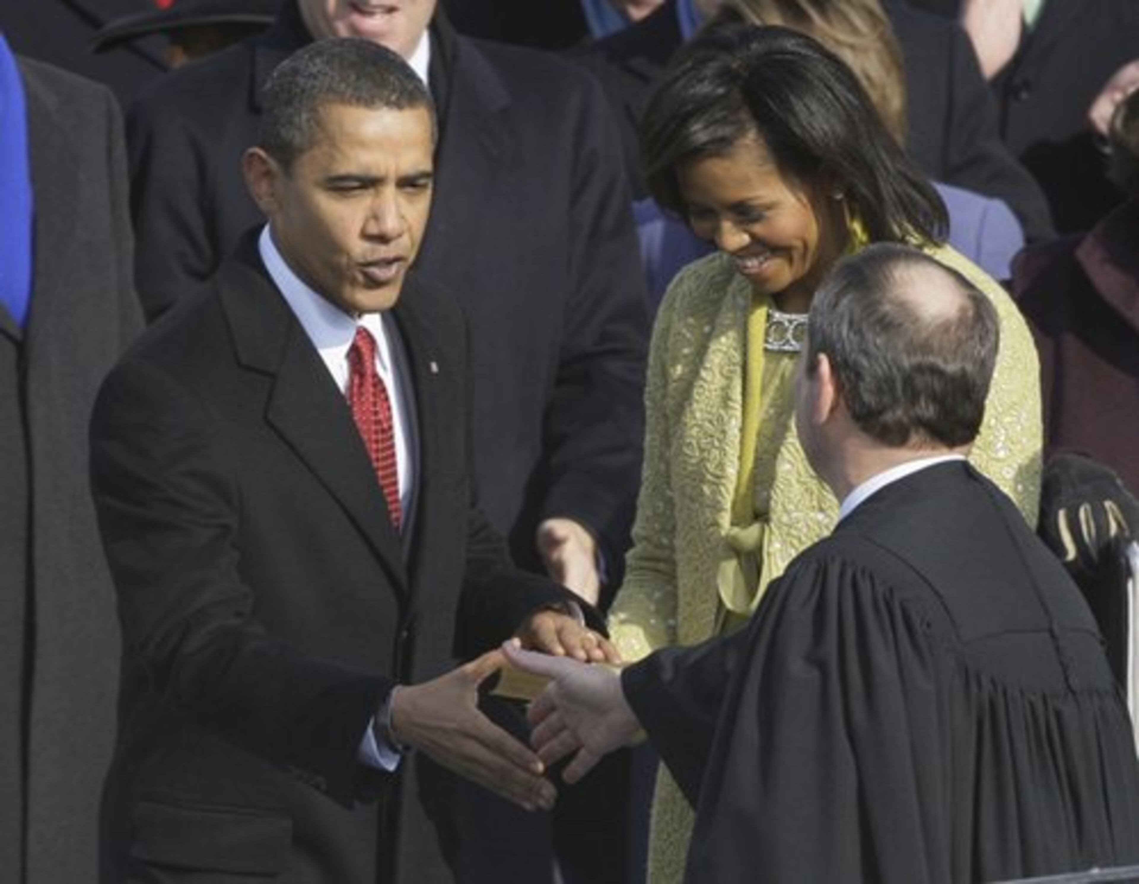 President Obama shakes hands with Chief Justice John Roberts after taking the oath of office.