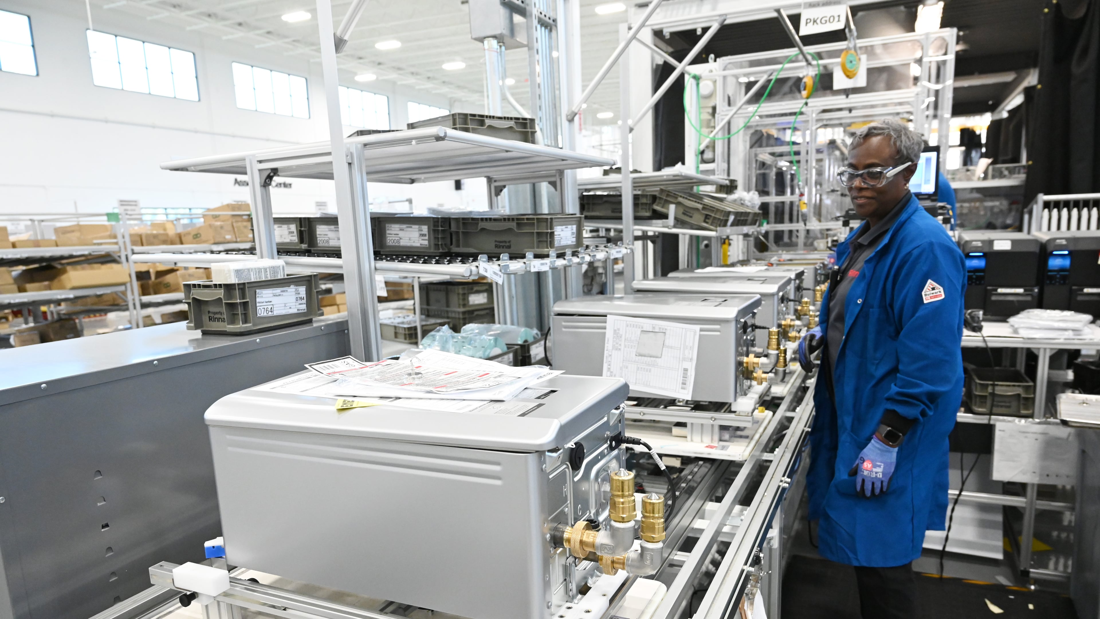 Gaynell Hurst assembles tankless water heaters at Rinnai America Corporation, Oct. 24, 2024, in Griffin. The company said it was threatened by pending rules for appliance efficiency. (Hyosub Shin/AJC)