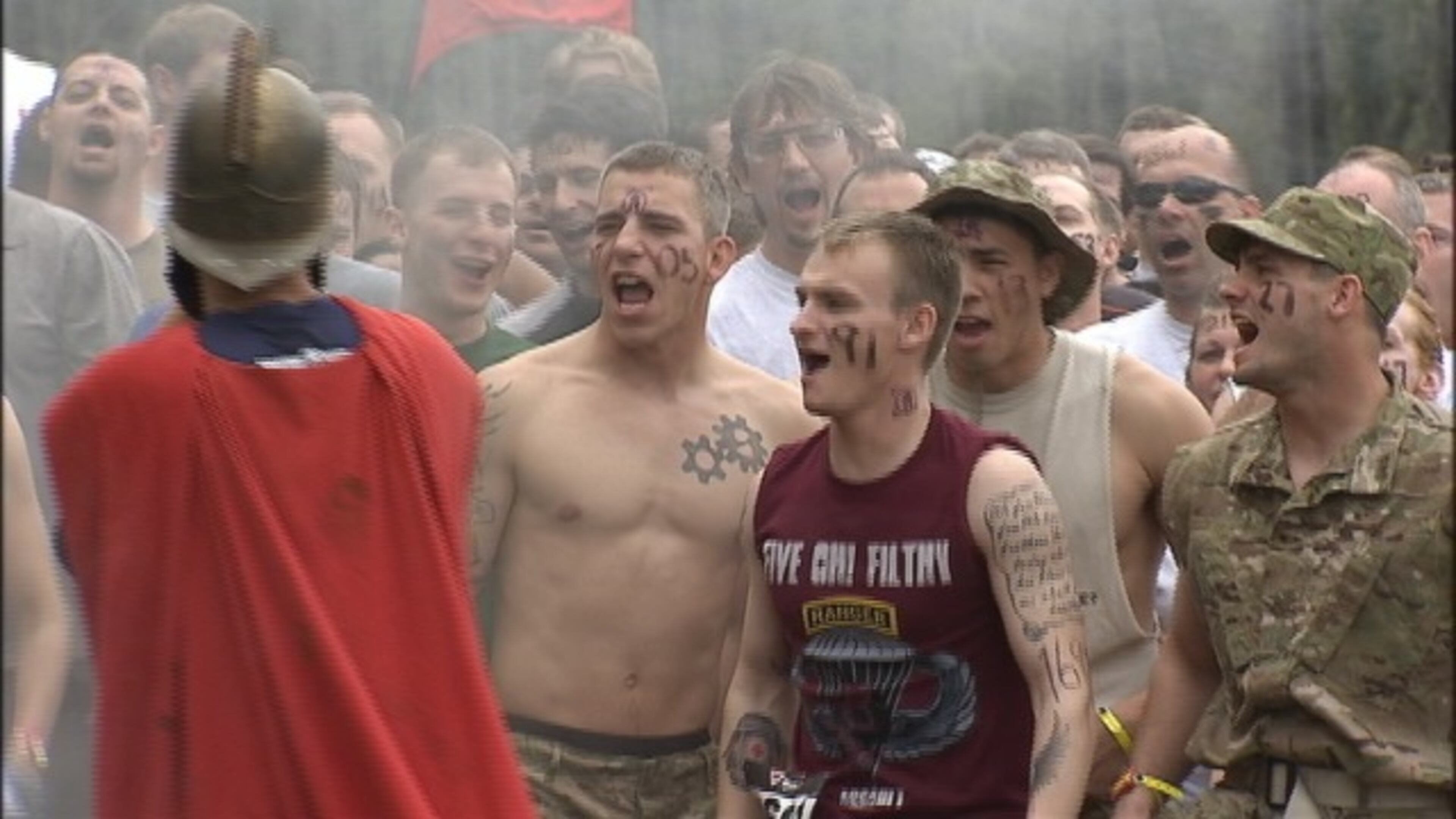 Runners battled mud, fire and barbed wire to compete in the Spartan Race at the National Whitewater Center in Charlotte.