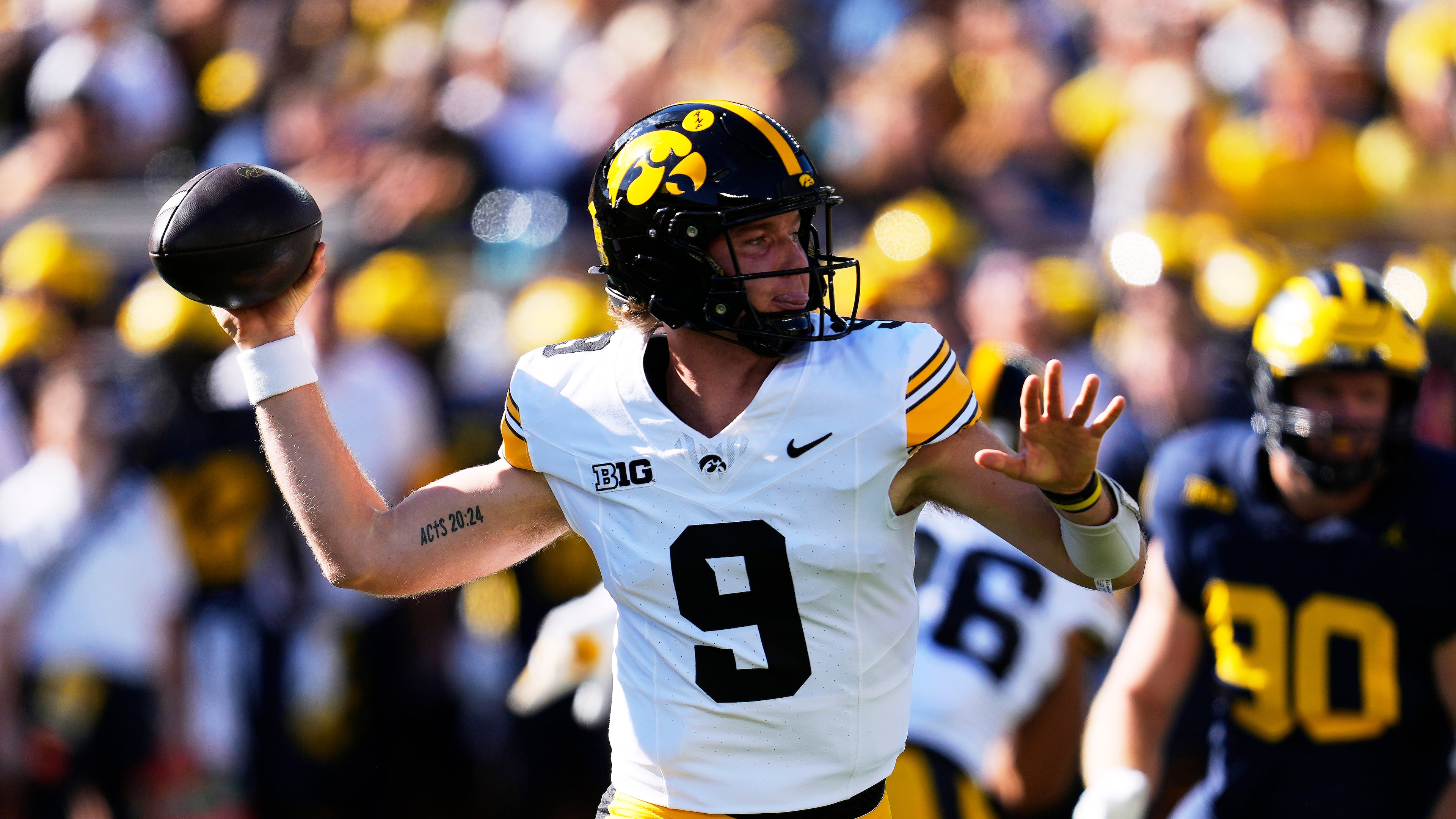 Iowa quarterback Hank Brown (9) throws against Michigan during the first half of an NCAA college football game in Ann Arbor, Mich., Saturday, Sept. 26, 2026. (AP Photo/Paul Sancya)
