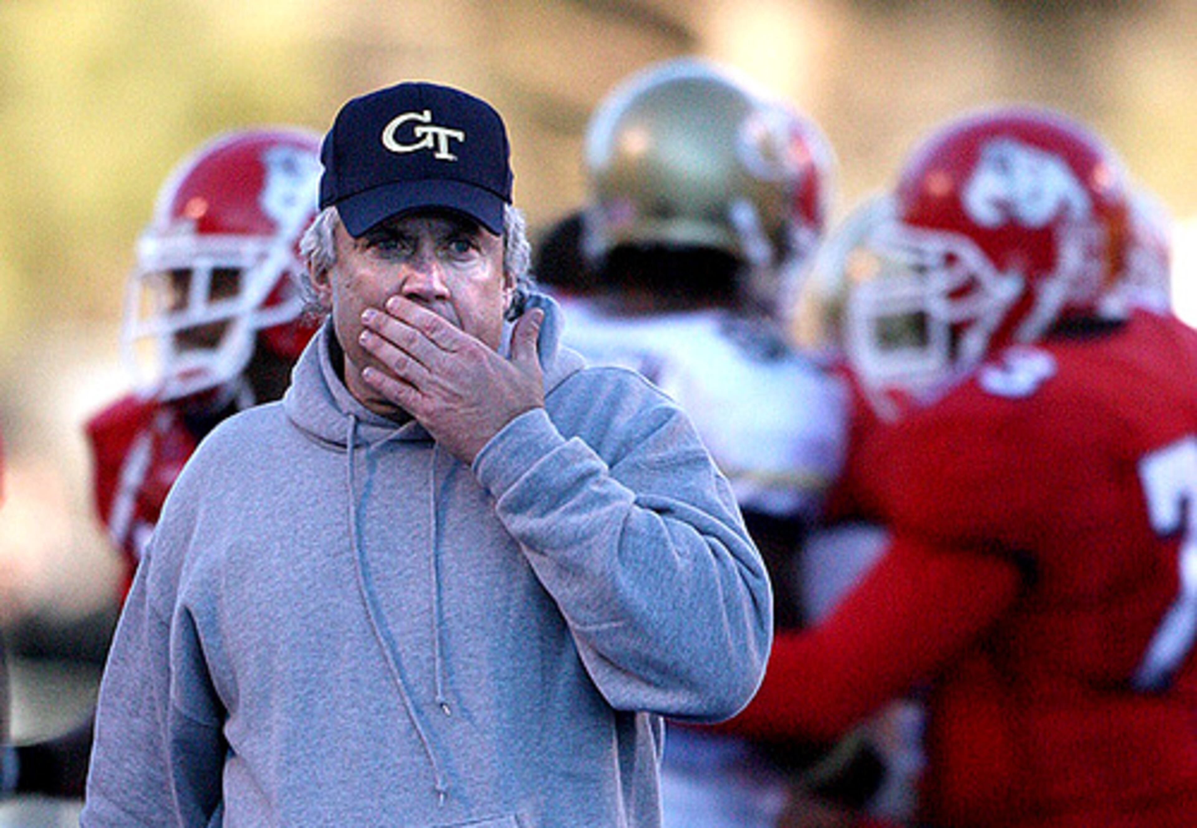Defensive coordinator Jon Tenuta, who took the head coaching reins for the bowl game, walks off the field as his Tech tenure comes to an end. He will not be retained by new coach Paul Johnson.