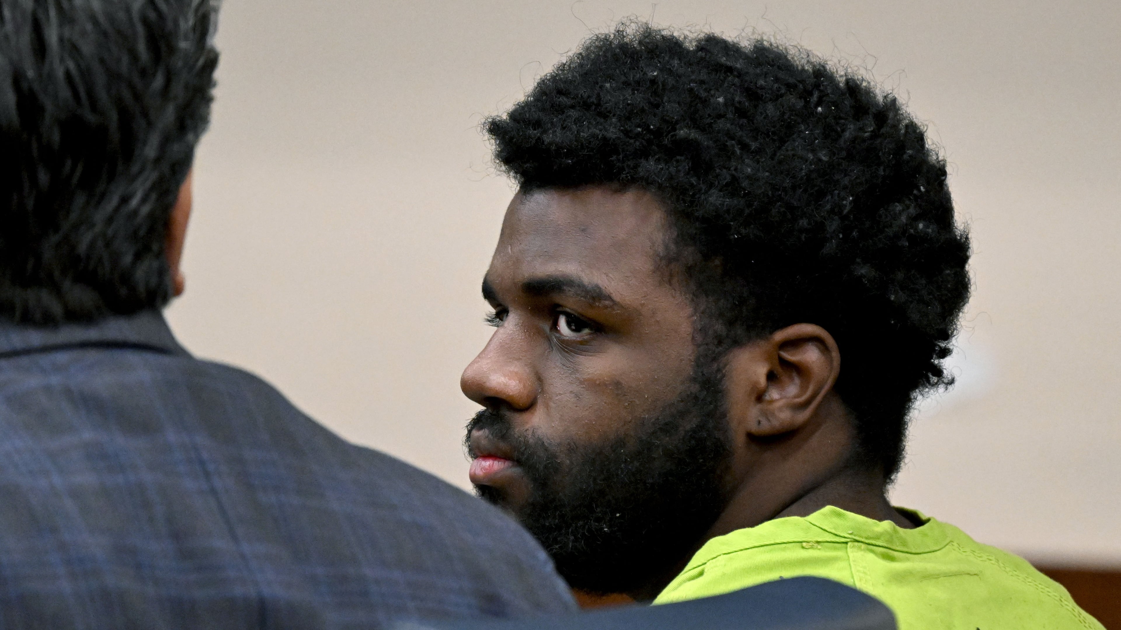Kingston Bradley, who is charged with murder after allegedly dismembering a woman in Smyrna, sits beside his attorney, Paul Camarillo (left) during a hearing before Cobb County Chief Magistrate Judge Brendan Murphy at the Cobb County Magistrate Court on Friday, Oct. 23, 2026, in Marietta. (Hyosub Shin/AJC)