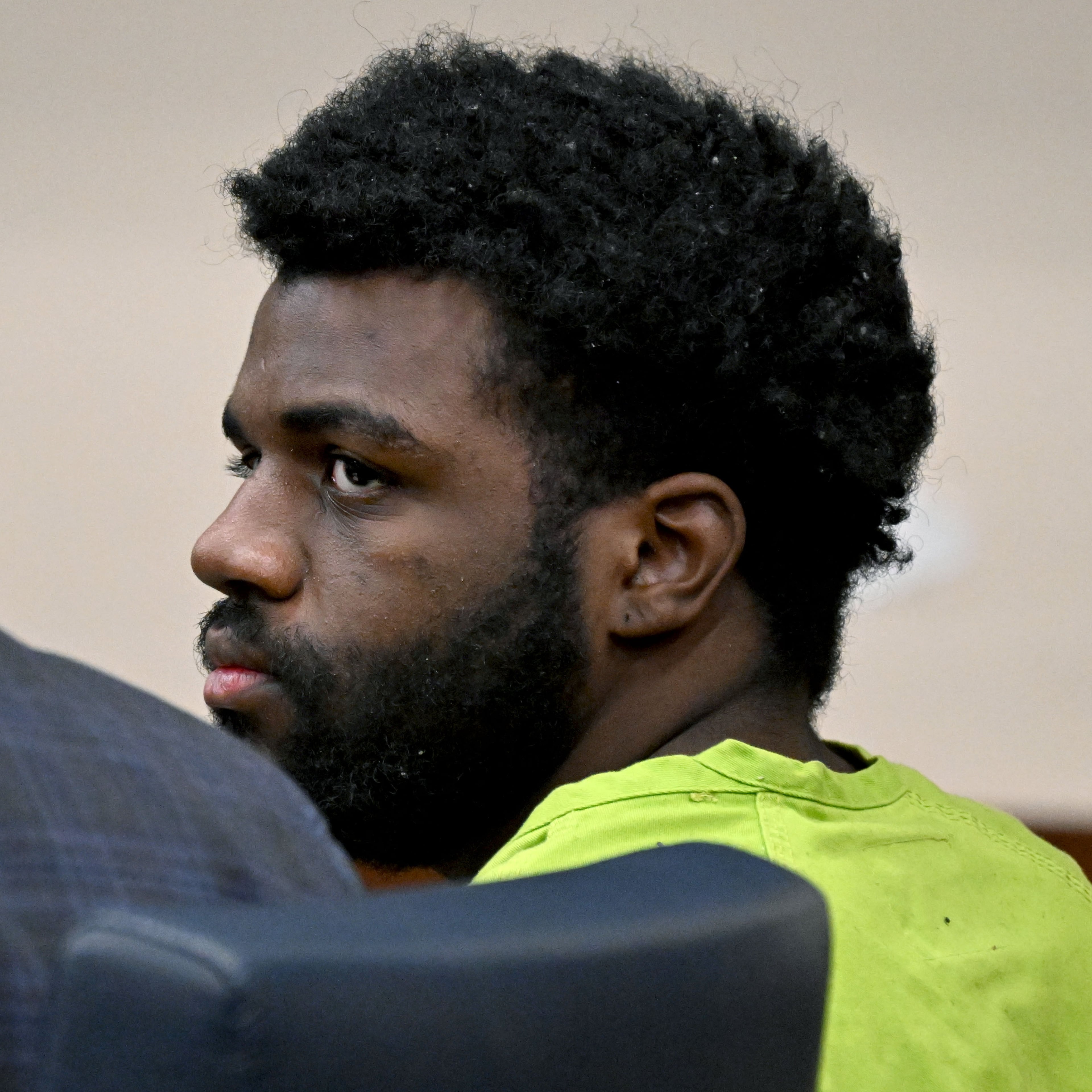 Kingston Bradley, who is charged with murder after allegedly dismembering a woman in Smyrna, sits beside his attorney, Paul Camarillo (left) during a hearing before Cobb County Chief Magistrate Judge Brendan Murphy at the Cobb County Magistrate Court on Friday, Oct. 23, 2026, in Marietta. (Hyosub Shin/AJC)
