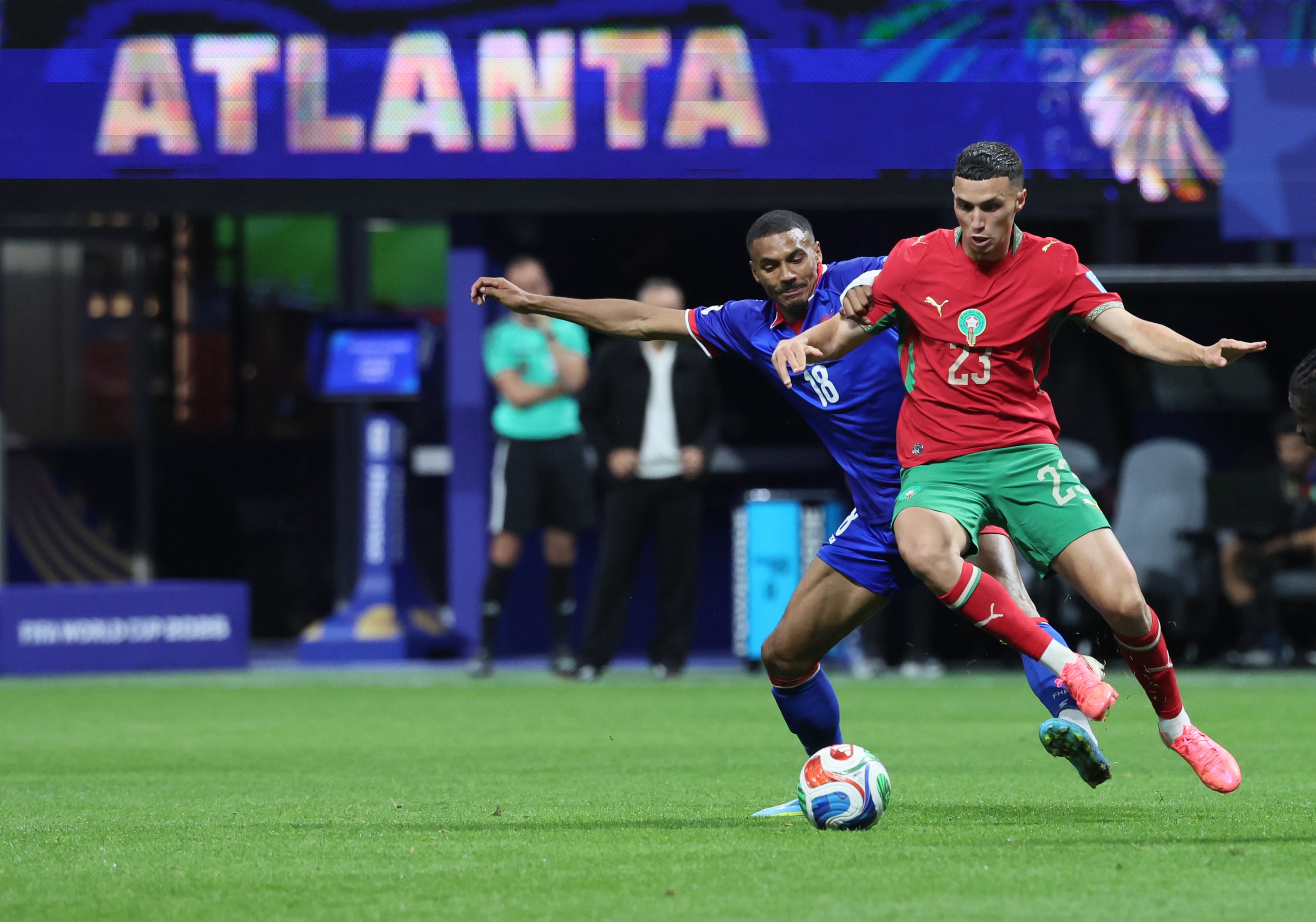 Haiti's Wilson Isidor, left, battles Morocco's Bilal El Khannouss for ball during second half of Morocco vs. Haiti Group C FIFA World Cup match at Atlanta Stadium (Mercedes-Benz Stadium) on Wednesday, June 24, 2026. (Jason Getz/AJC)