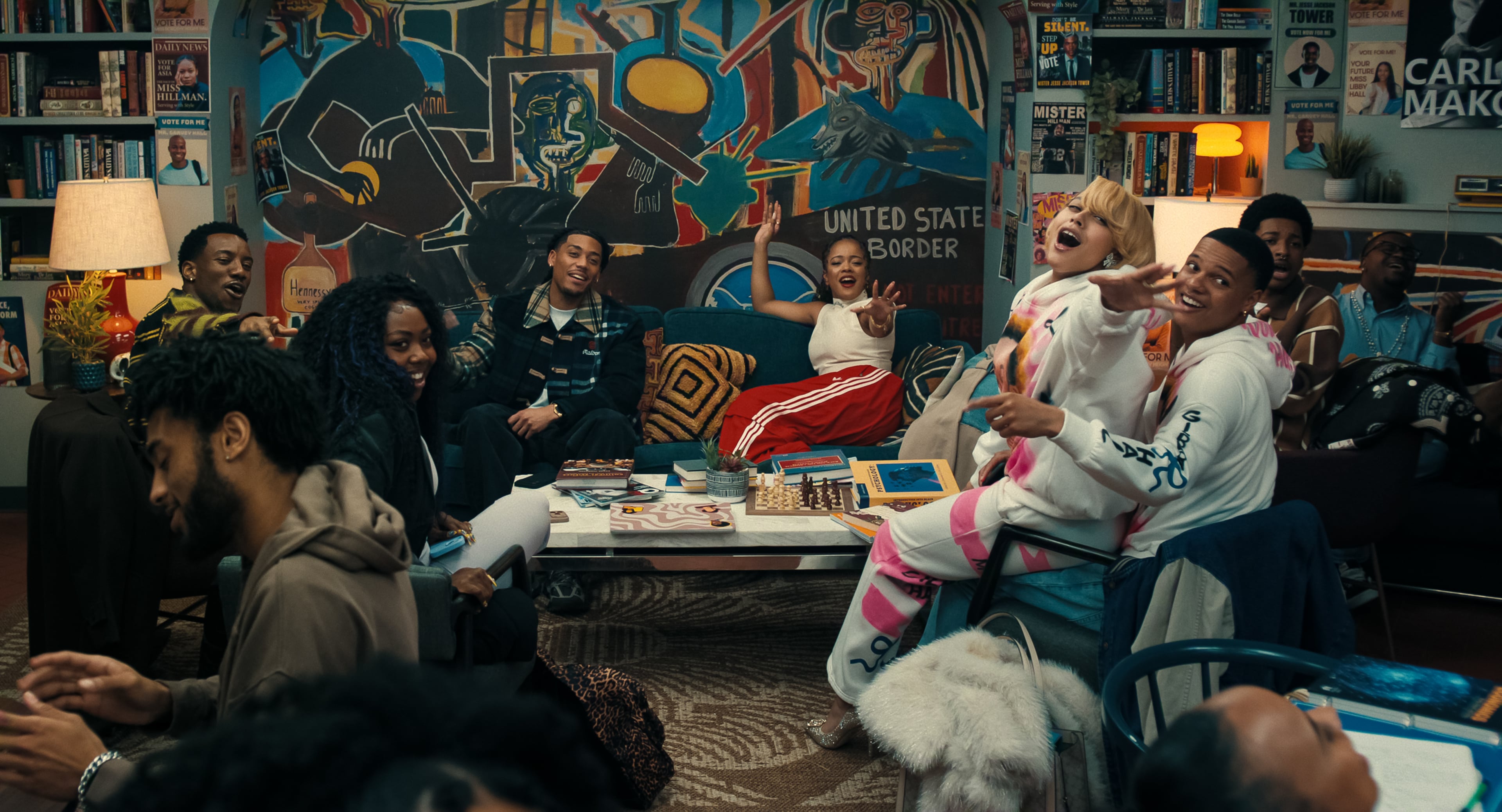 The "A Different World" cast hangs out at an updated version of the Pit, shot at Cinespace Studios in Atlanta. (From left) Chibuikem Uche as Kojo, Alijah Kai as Rashida, Cornell Young IV as Shaquille, Maleah Joi Moon as Deborah, Kennedi Reece as Hazel, Elijah J. Roberts as Jalen, Jordan Aaron Hall as Amir. (Courtesy of Netflix)