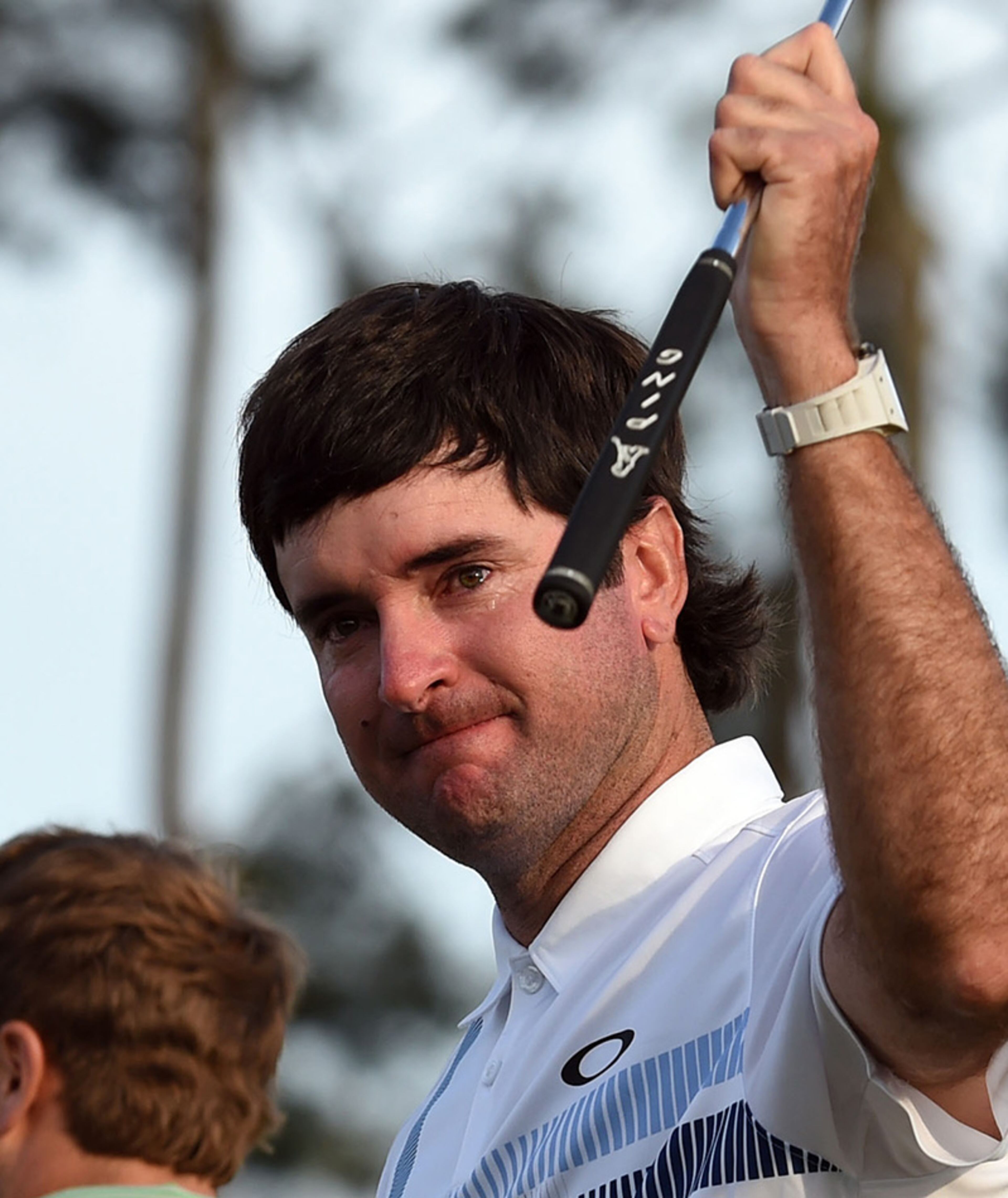 With tears in his eyes, Bubba Watson acknowledges the gallery after winning the 78th Masters Tournament Sunday, April 13, 2014, at Augusta National Golf Club.