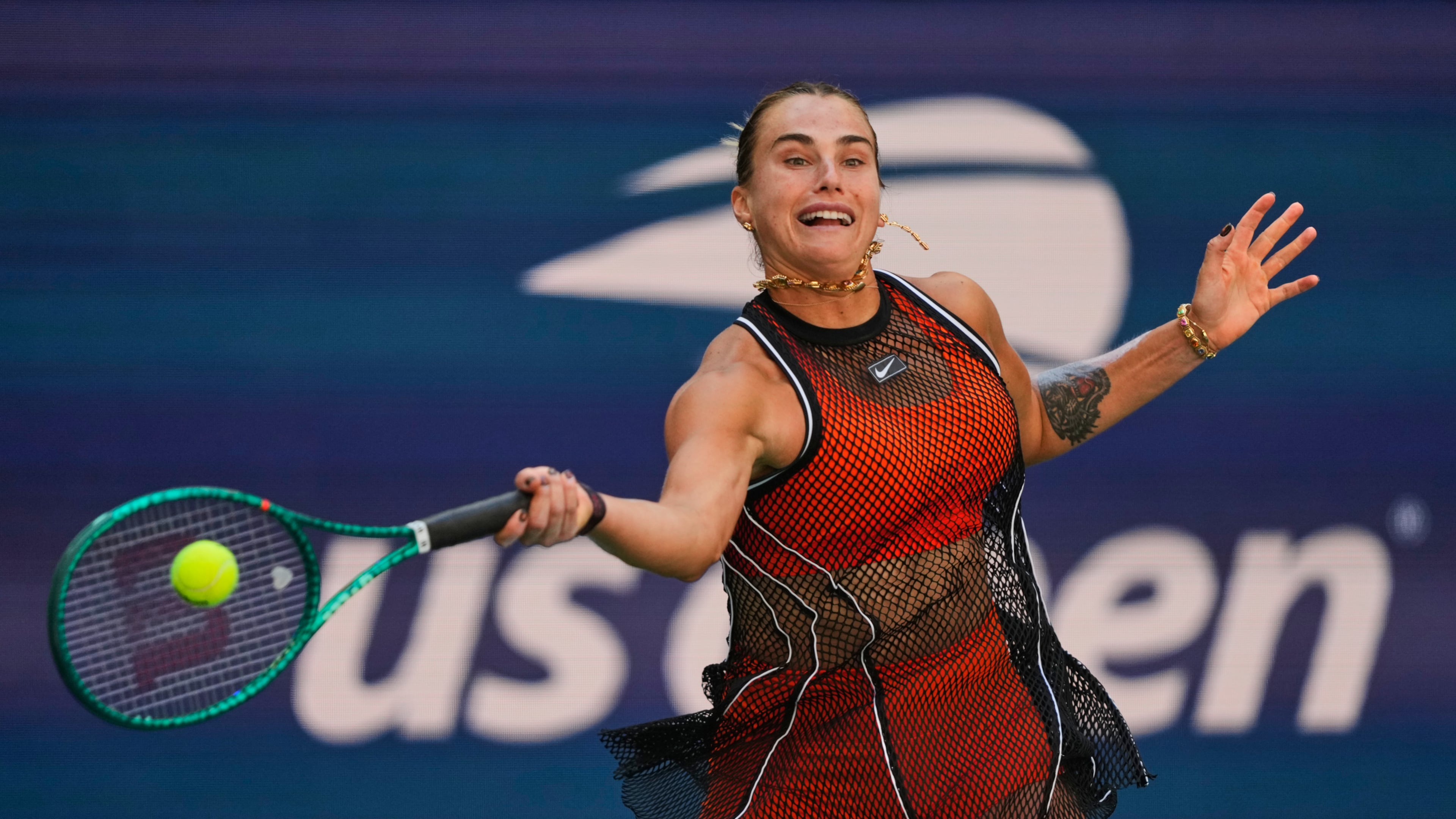 Aryna Sabalenka, of Belarus, returns the ball during a mixed doubles match at the U.S. Open tennis championships, Tuesday, Aug. 25, 2026, in New York. (AP Photo/Yuki Iwamura)