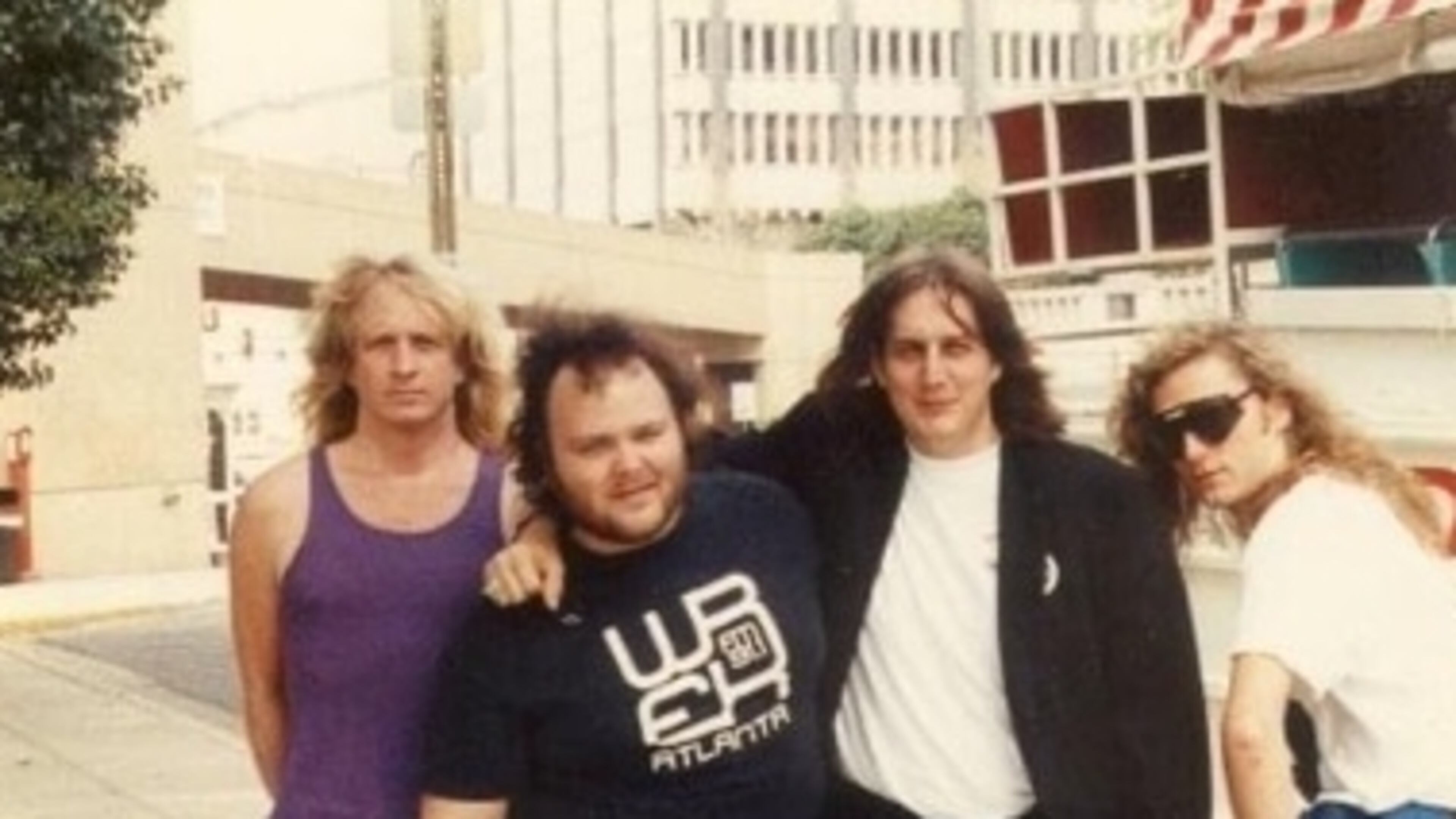 Jon Kincaid, in WREK T-shirt, with friends in downtown Atlanta. Kincaid befriended Georgia bands and promoted their music on his weekly show.