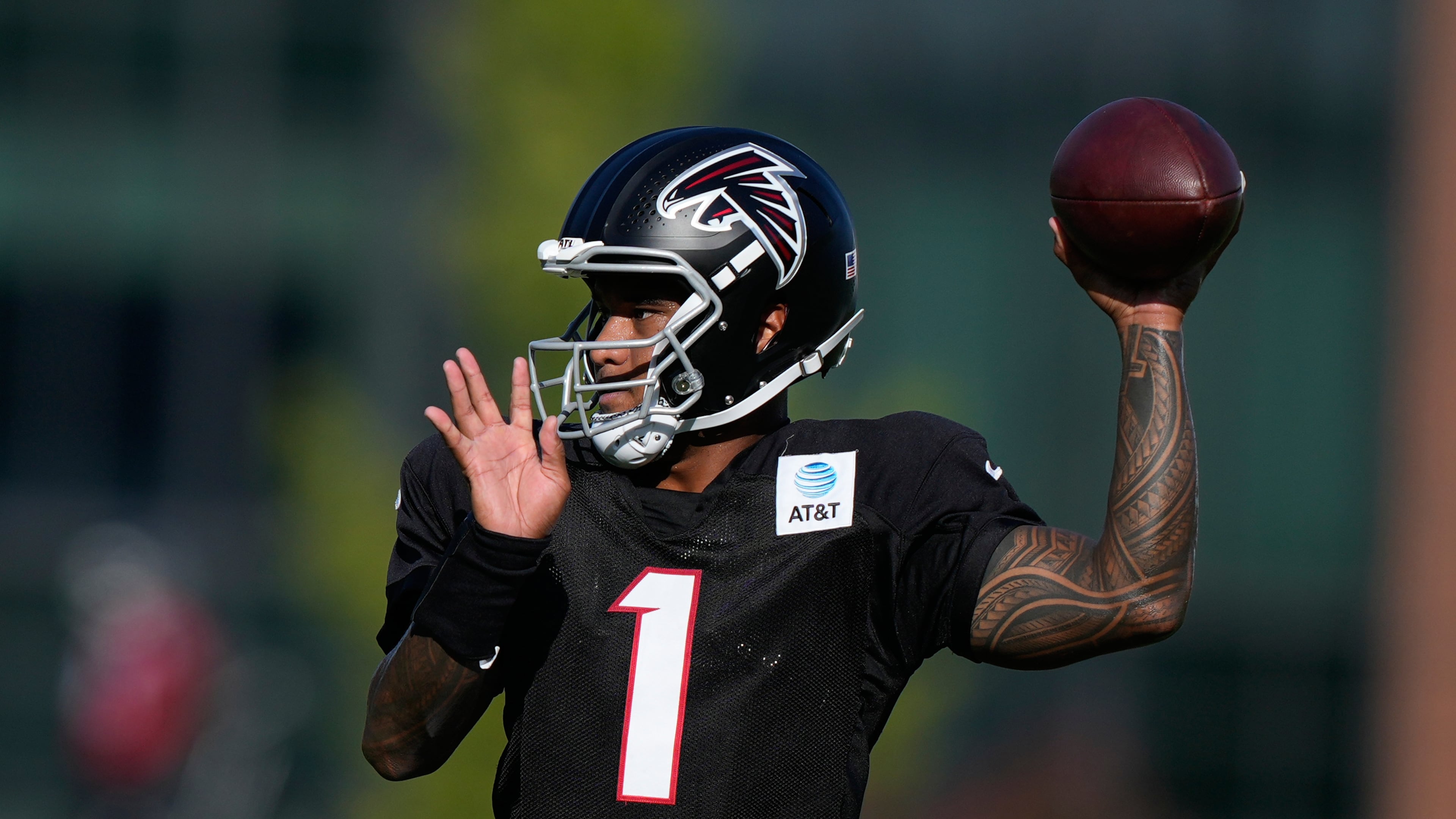 Atlanta Falcons quarterback Tua Tagovailoa runs drills during an NFL football training camp practice on Monday, Aug. 17, 2026, in Flowery Branch, Ga. (Brynn Anderson/AP)