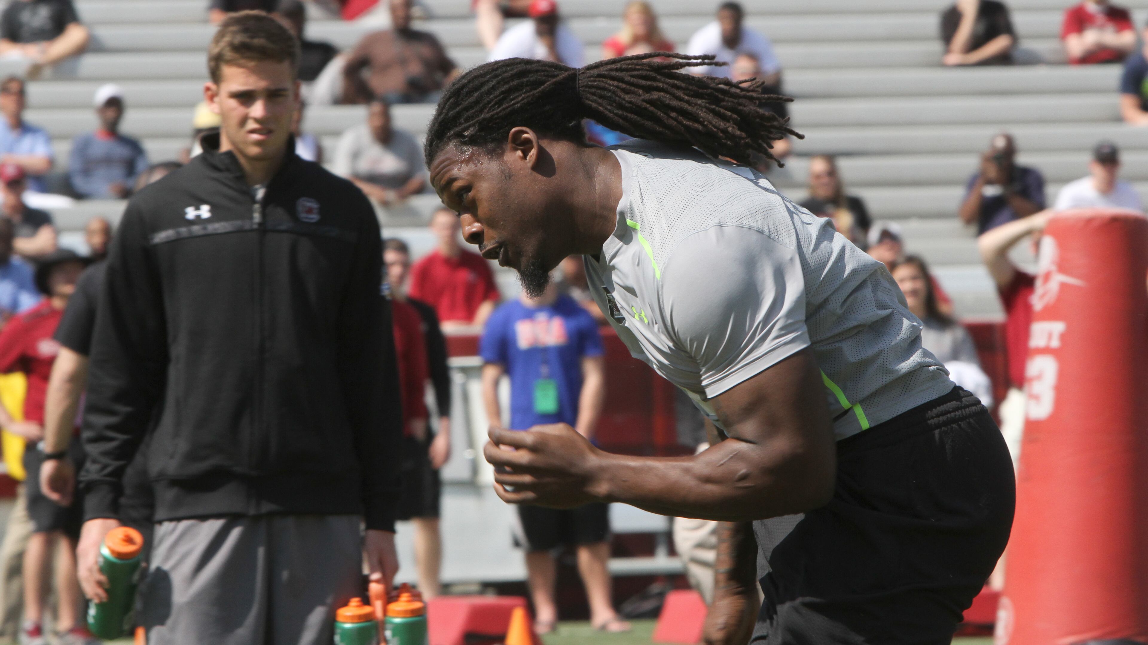 South Carolina defensive end Jadeveon Clowney competes in a drill for NFL representatives at South Carolina football pro day in Columbia, S.C., Wednesday, April 2, 2014. (AP Photo/Mary Ann Chastain)