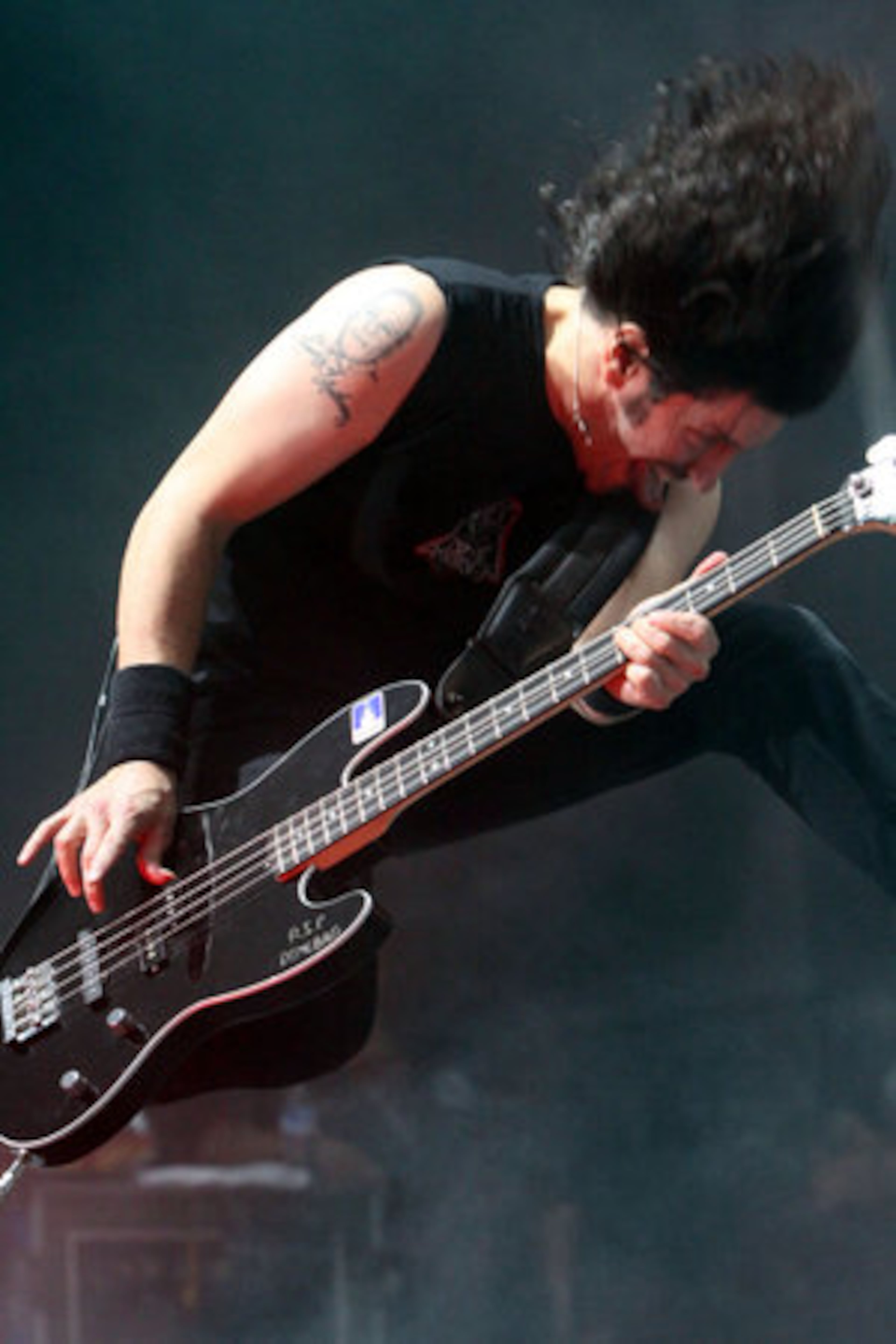 Frank Bello lays down the bass for Anthrax.