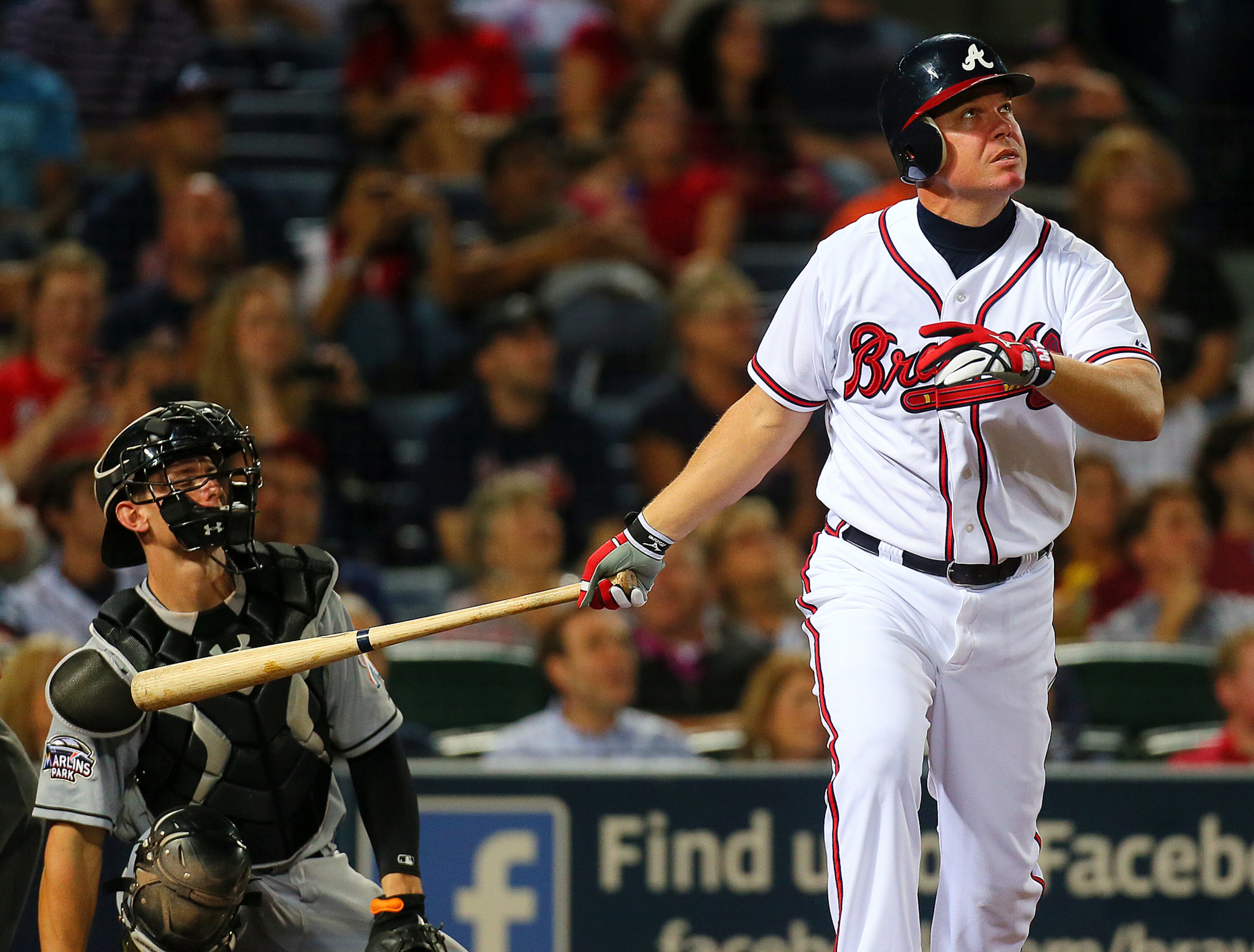 Atlanta Braves Chipper Jones hits a RBI sacrafice fly to score Jason Heyward for a 2-1 lead over the Marlins in the 6th inning at Turner Field in Atlanta on Tuesday , Sept. 25, 2012. CURTIS COMPTON / CCOMPTON@AJC.COM