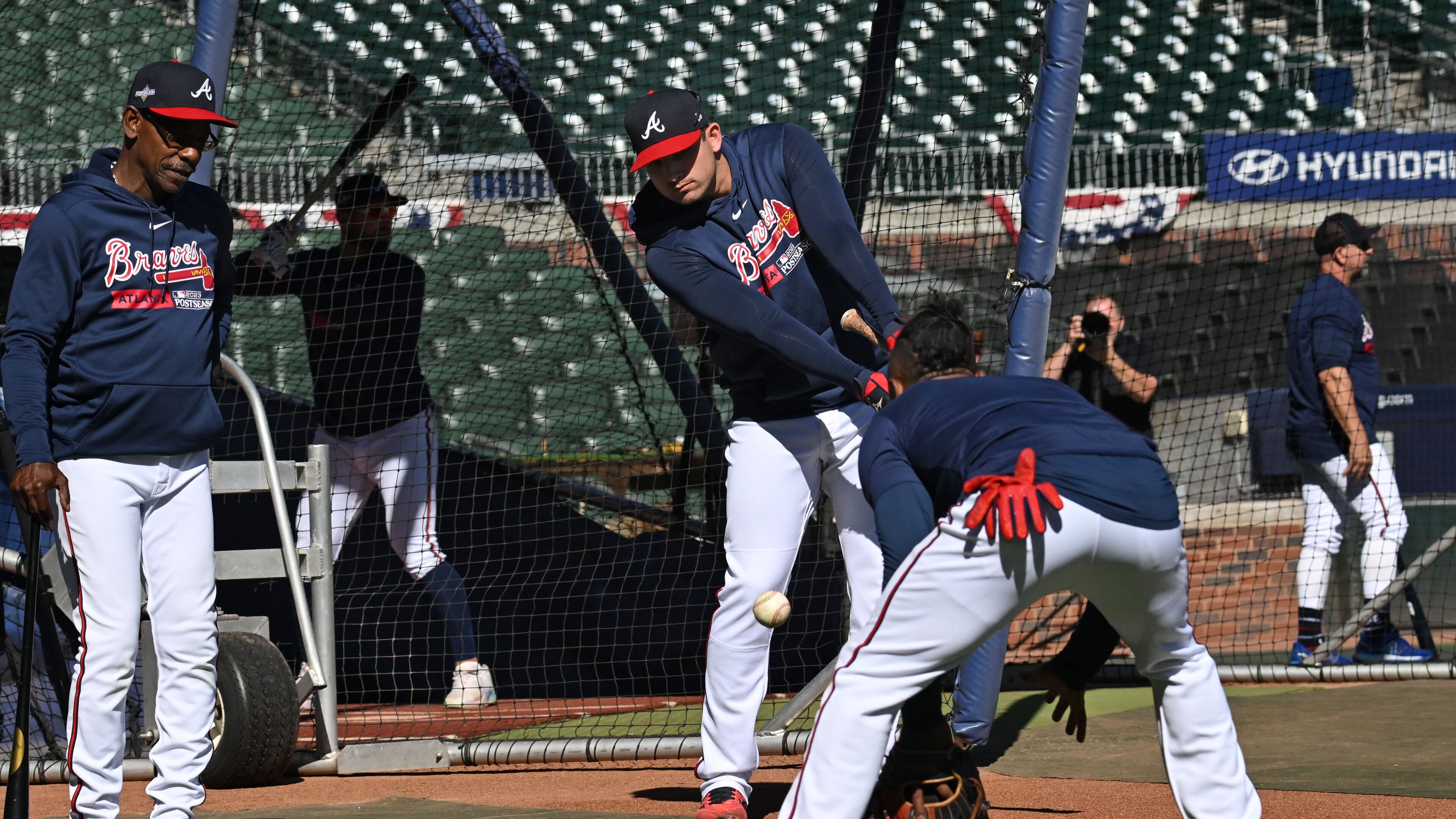 Atlanta Braves third baseman Austin Riley (27) works out with Atlanta Braves second baseman Ozzie Albies (1) prior to Game 2 of the 2023 National League Division Series at Truist Park, Monday, October 9, 2023, in Atlanta. (Hyosub Shin / Hyosub.Shin@ajc.com)