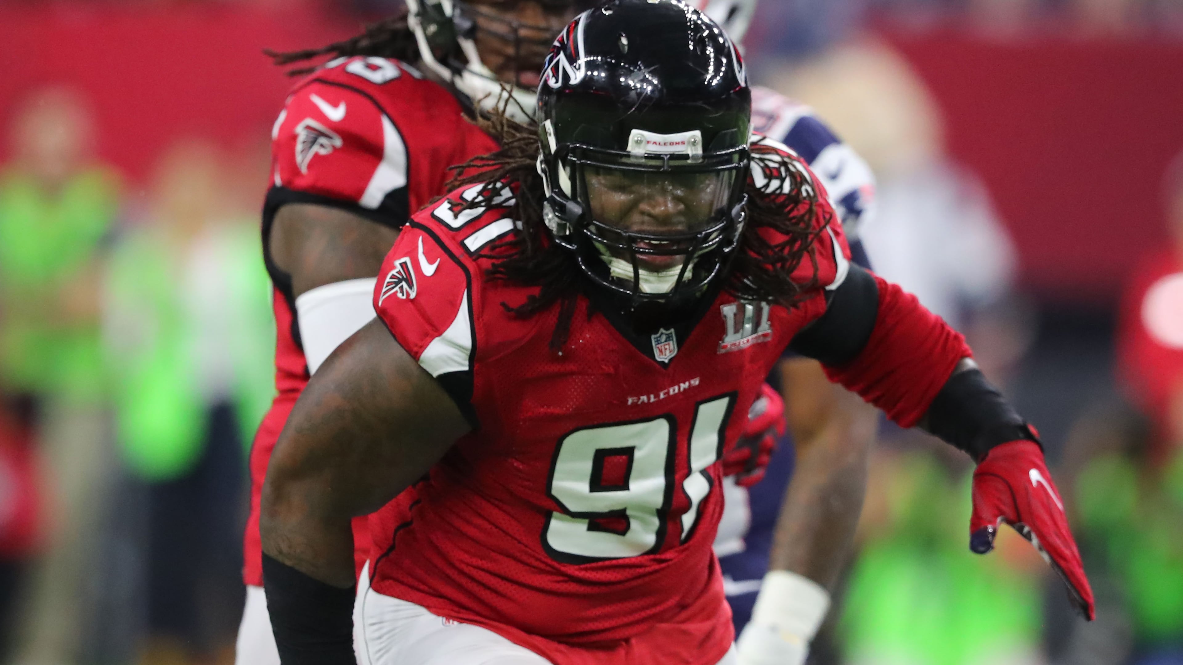 FEBRUARY 5, 2017 HOUSTON TX Atlanta Falcons defensive end Courtney Upshaw (91) celebrates as he sacks New England Patriots quarterback Tom Brady (12) during the first quarter as the Atlanta Falcons meet the New England Patriots in Super Bowl LI at NRG Stadium in Houston, TX, Sunday, February 5, 2017. Curtis Compton/AJC