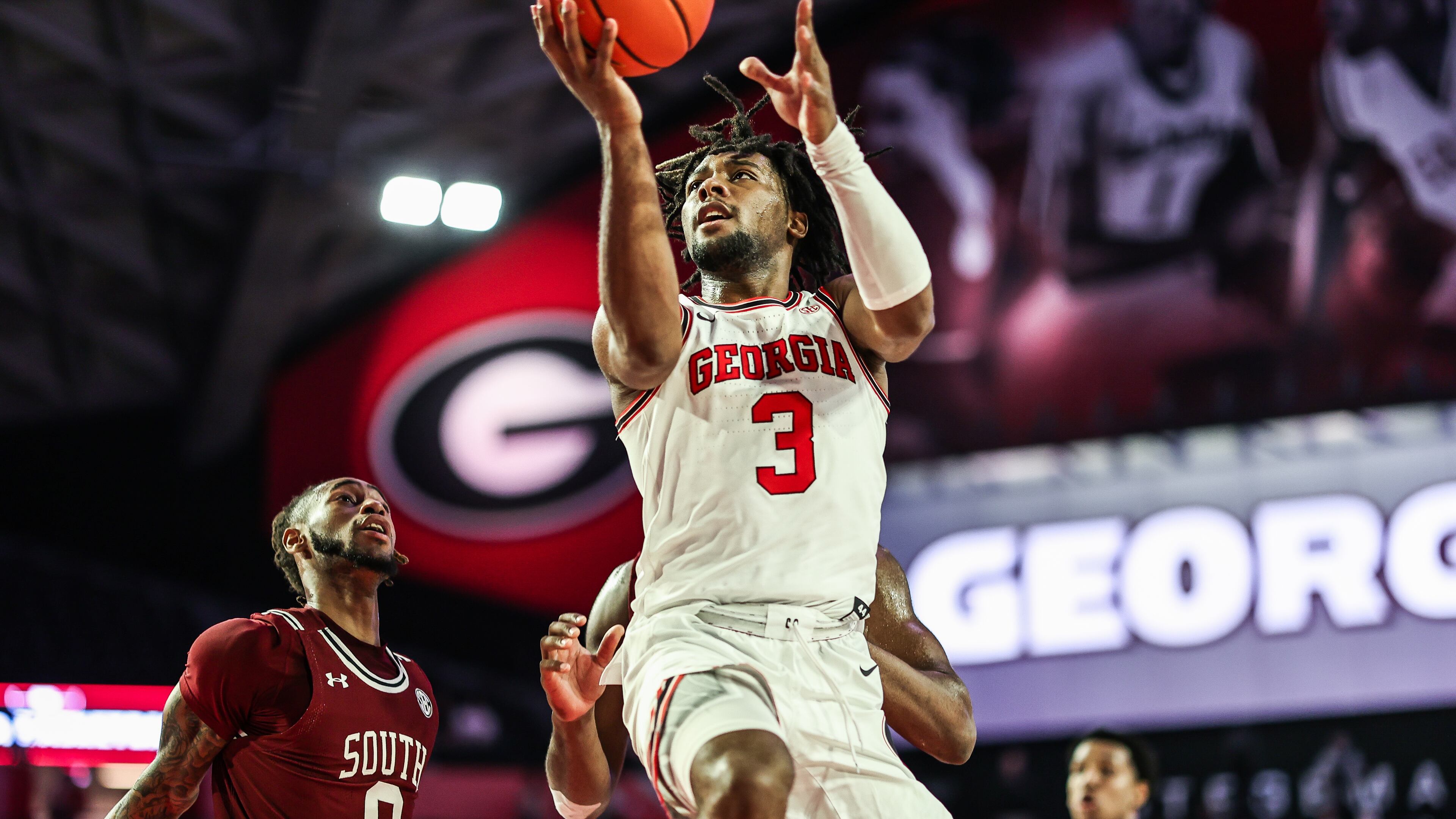 Georgia's Kario Oquendo goes up for shot against South Carolina at Stegeman Coliseum in Athens, Ga., on Saturday, Feb. 12, 2022. (Photo by Mackenzie Miles / UGA Athletics)