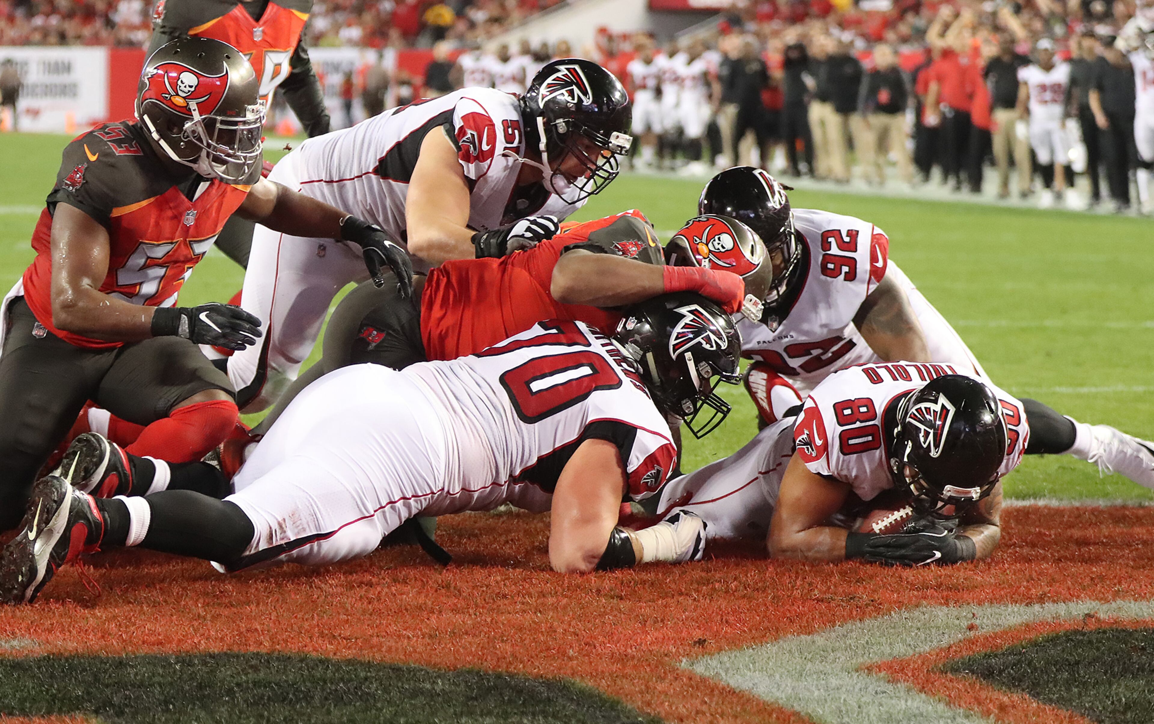 December 18, 2017 Tampa: Falcons tight end Levine Toilolo recovers a fumble by running back Devonta Freeman into the endzone to take a 14-7 lead over the Bucs during the second quarter in a NFL football game on Monday, December 18, 2017, in Tampa. Curtis Compton/ccompton@ajc.com