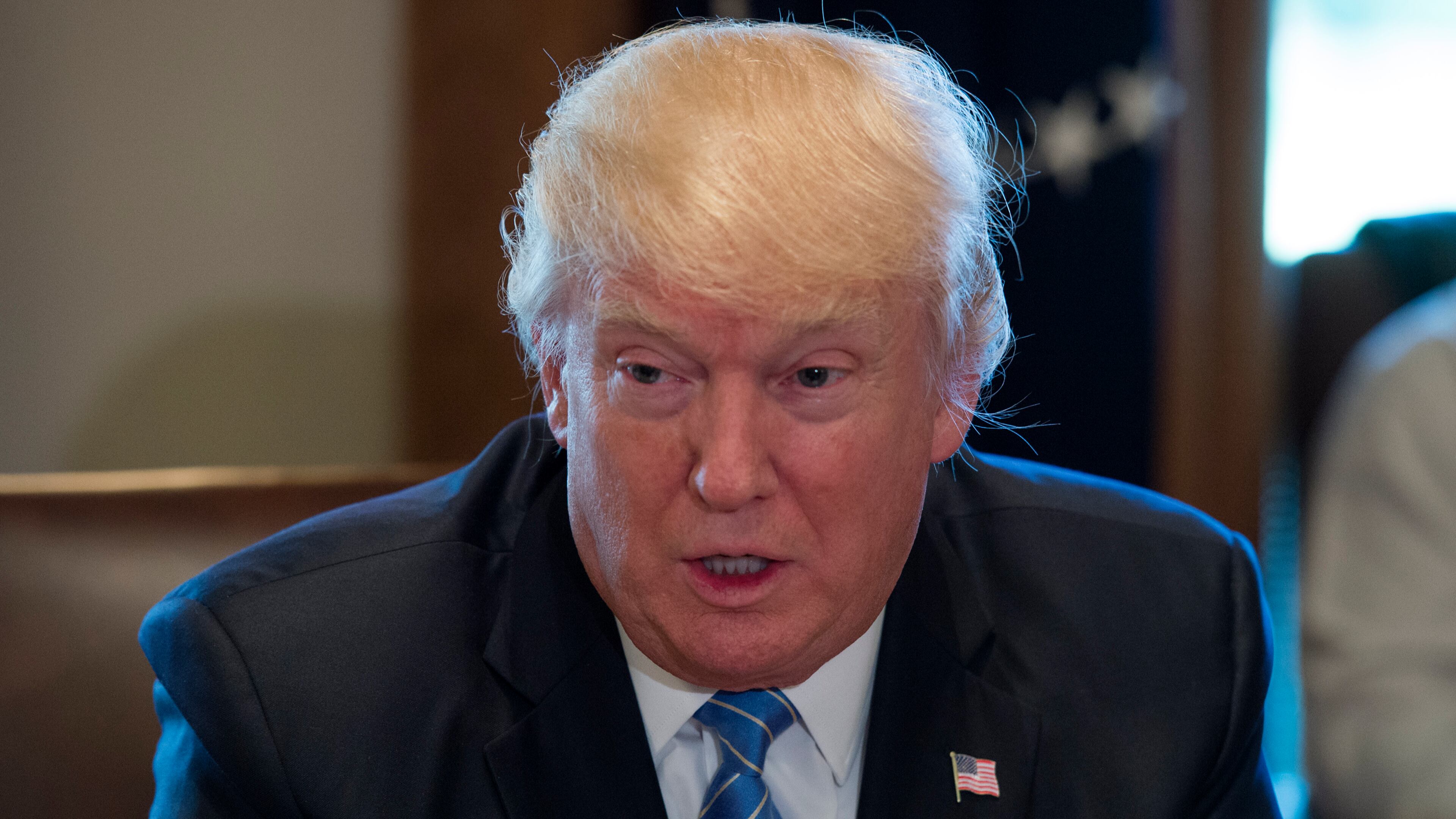 U.S. President Donald Trump holds a listening session on health care with truckers and CEOs from the American Trucking Associations in the Cabinet Room at the White House on March 23, 2017 in Washington, DC. (Photo by Molly Riley-Pool/Getty Images)