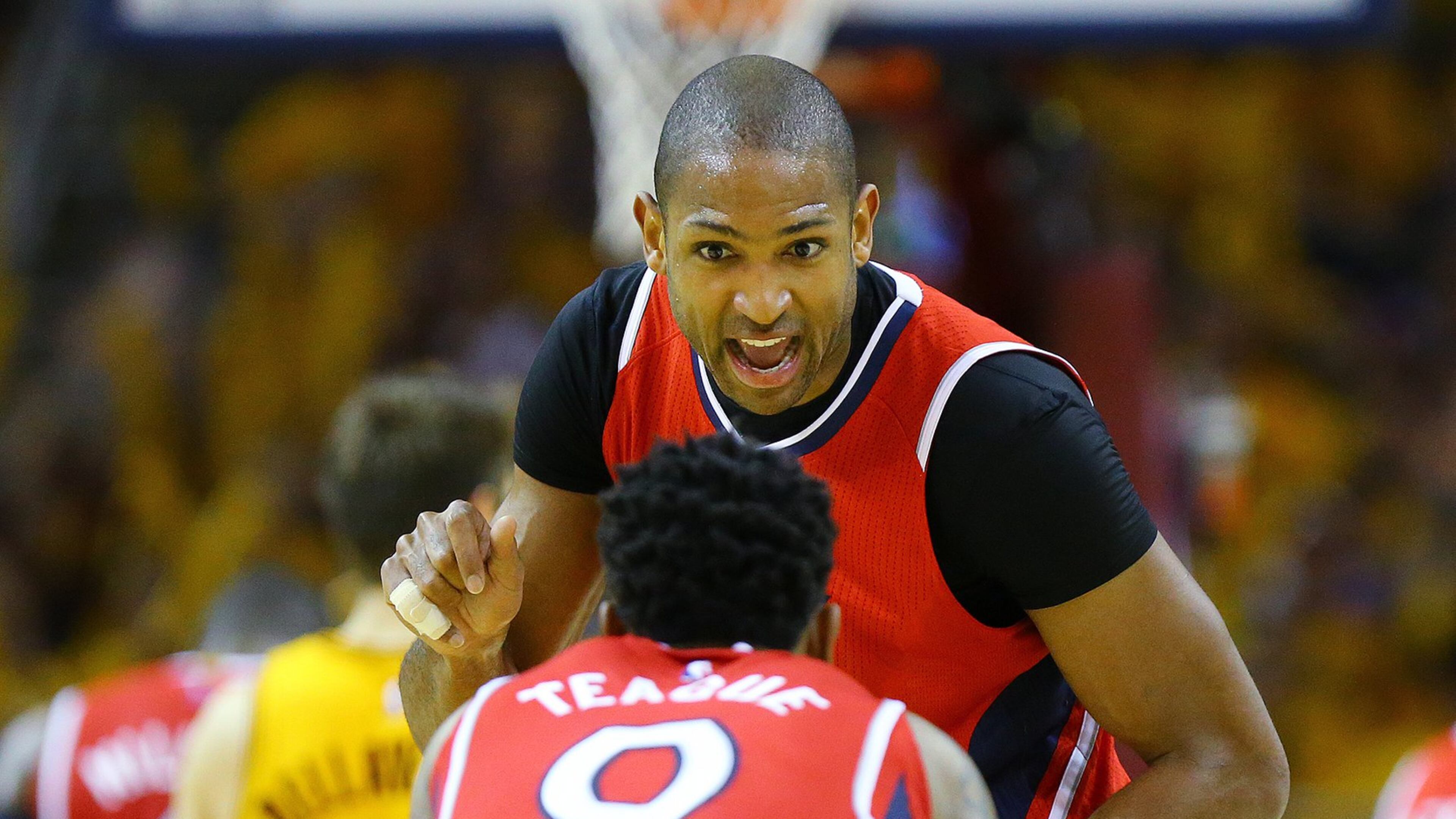 Al Horford talks with Jeff Teague after a Cavaliers score during Game 4 of the Eastern Conference Finals on Tuesday, May 26, 2015, in Cleveland. Curtis Compton / ccompton@ajc.com