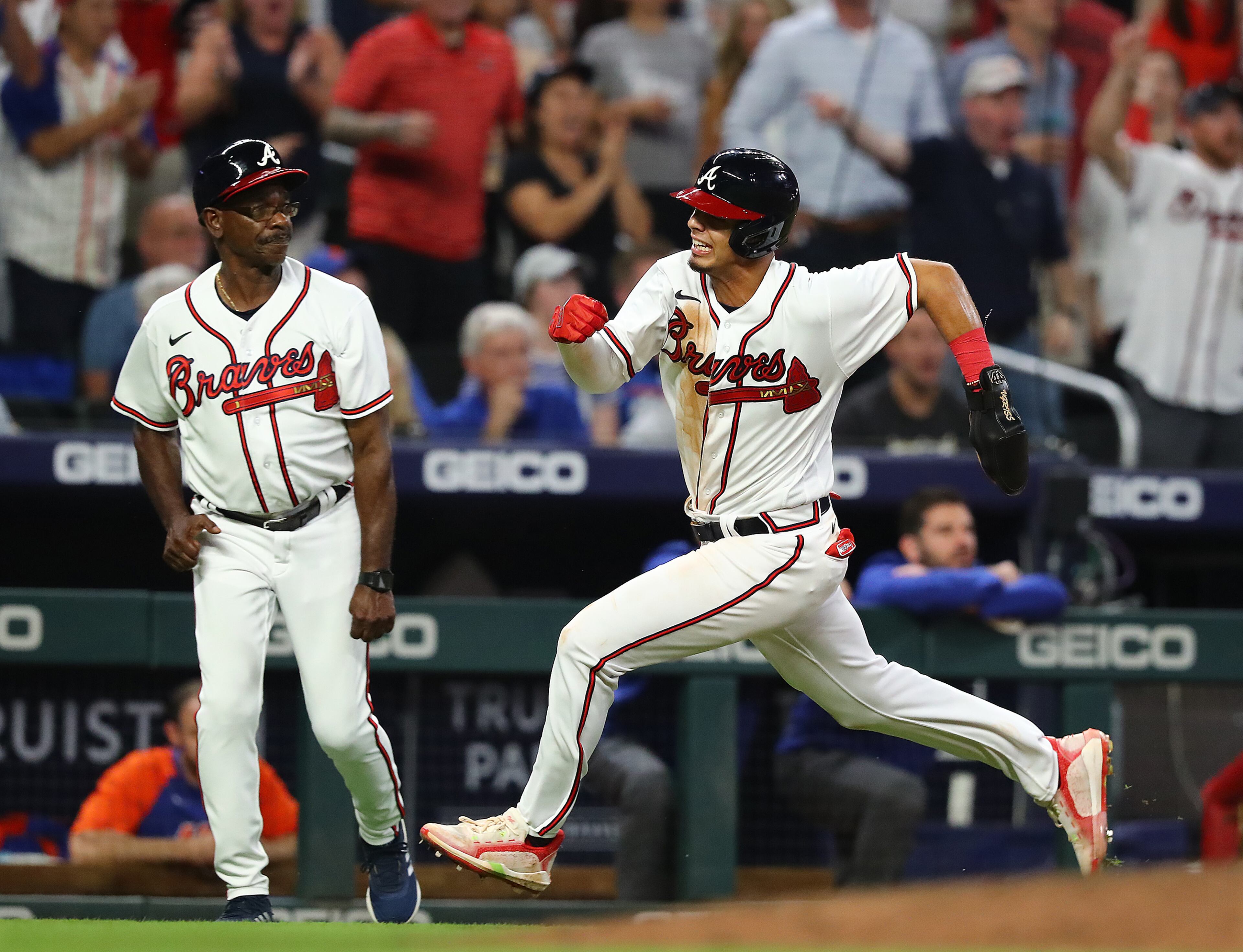 Braves second baseman Vaughn Grissom races home to score on outfielder Michael Harris' RBI single to take a 3-2 lead over the New York Mets during the seventh inning in a MLB baseball game on Thursday, August 18, 2022, in Atlanta. The Braves beat the Mets 3-2 to win the series 3 games to 1. “Curtis Compton / Curtis Compton@ajc.com