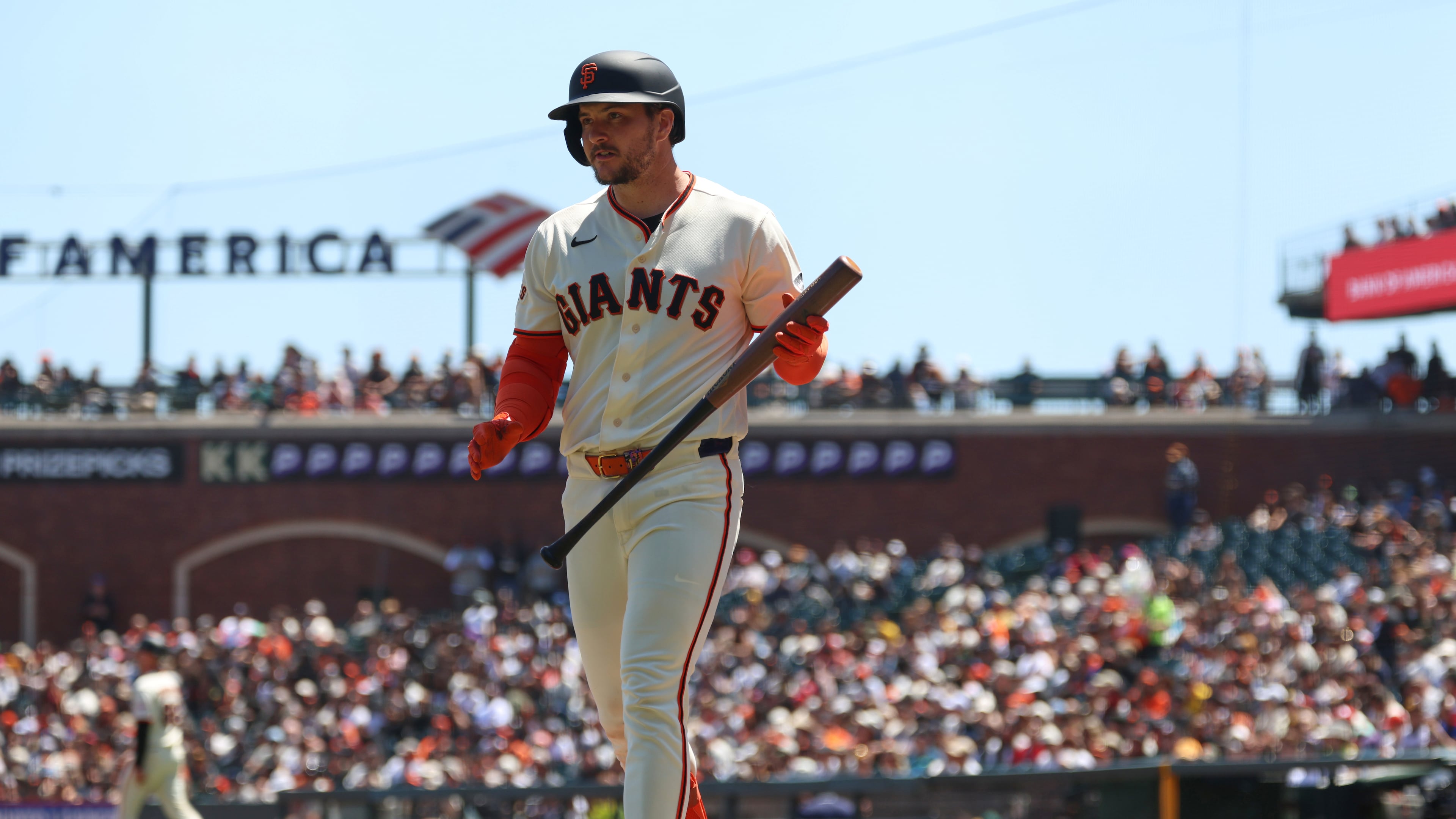 San Francisco Giants' Patrick Bailey walks back to the dugout after striking out against the San Diego Padres during the third inning of a baseball game in San Francisco, Wednesday, May 6, 2026. (AP Photo/Jed Jacobsohn)