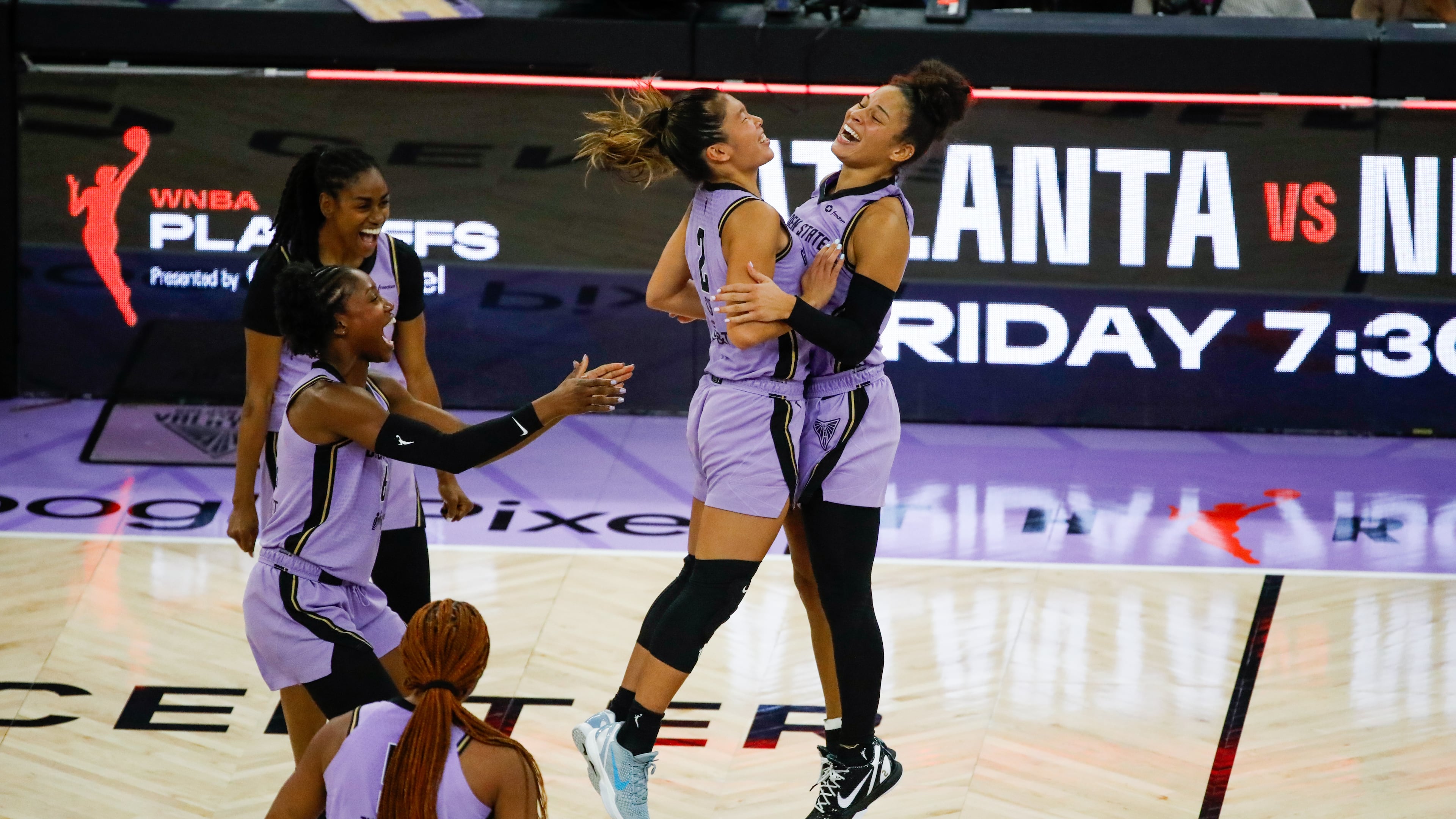 Golden State Valkyries guard Kaitlyn Chen (2) and Golden State Valkyries guard Veronica Burton (22) celebrate their win against the Las Vegas Aces during Game 2 of the WNBA Semifinals in San Francisco, Wednesday, Oct. 7, 2026. (Yalonda M. James/San Francisco Chronicle via AP)