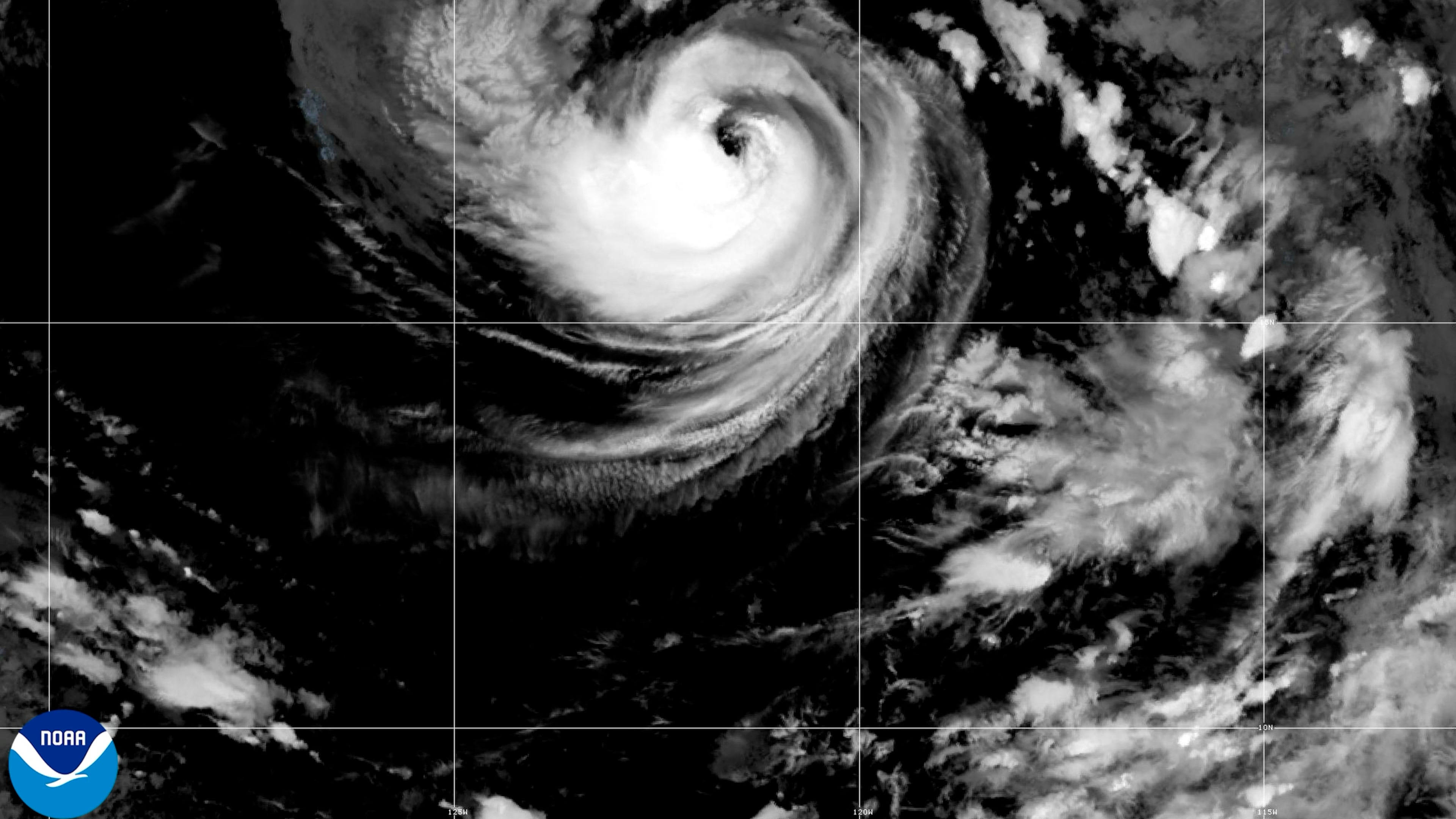 This satellite image released by NOAA shows Hurricane Karina strengthening off the southern tip of Baja California on Sunday, Aug. 30, 2026. (NOAA via AP)