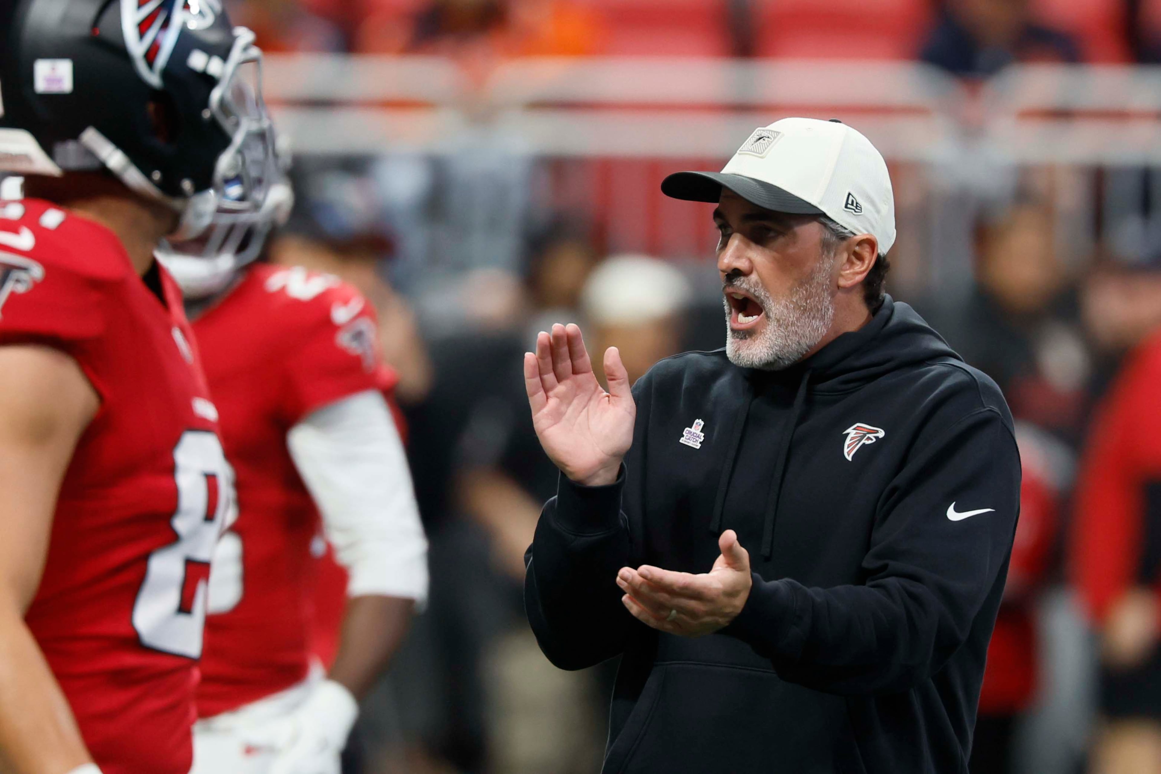 Atlanta Falcons head coach Kevin Stefanski cheers for his team during warmups before the game against the Chicago Bears at Mercedes-Benz Stadium in Atlanta on Sunday, Oct. 18, 2026. (Miguel Martinez/AJC)