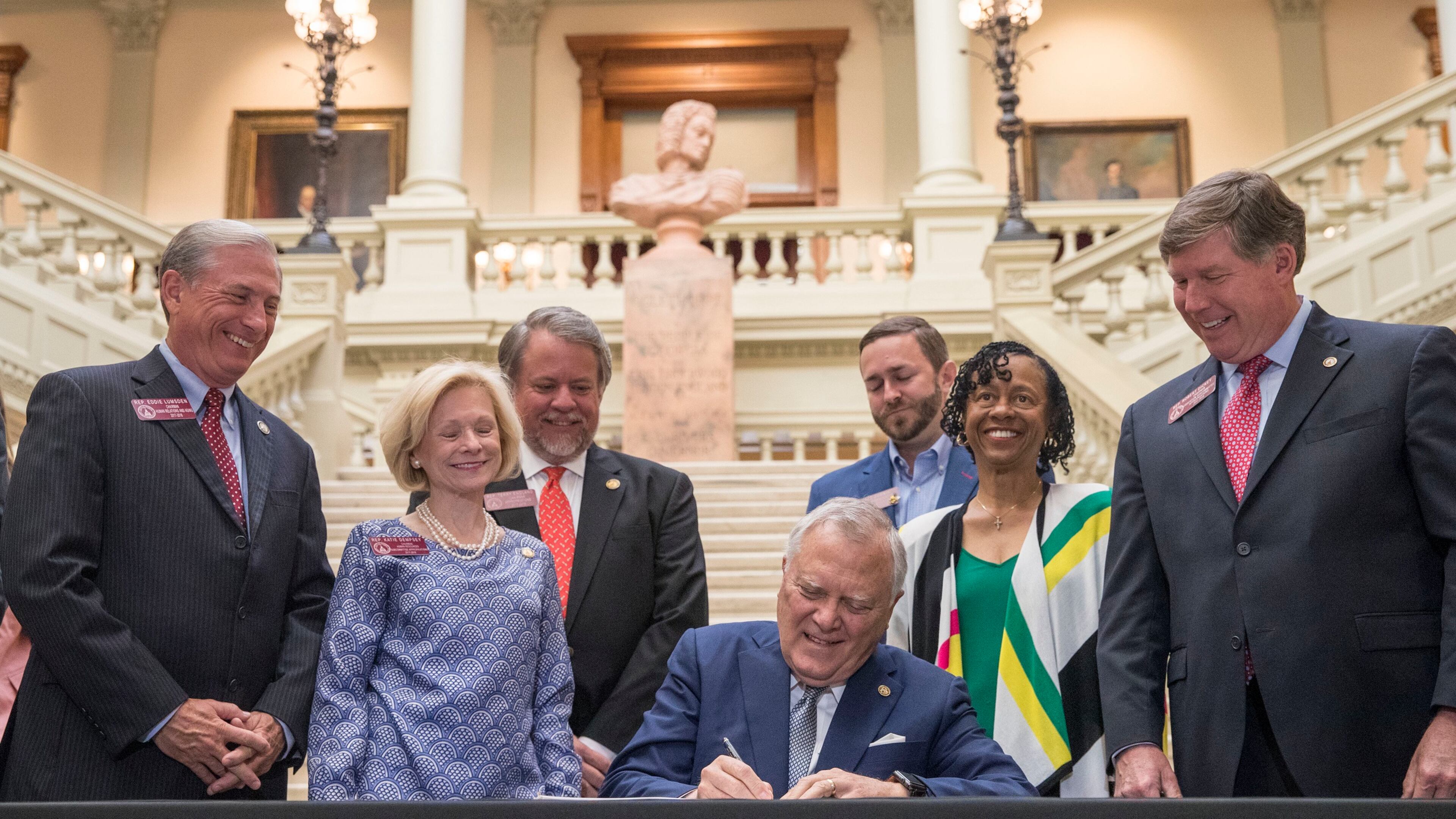 Gov. Nathan Deal signs the 2019 fiscal year state budget at the Georgia state Capitol. Deal has made it a priority while governor to build up the state’s reserves, which are now estimated at $2.5 billion, to guard against an economic downturn. ALYSSA POINTER/ALYSSA.POINTER@AJC.COM