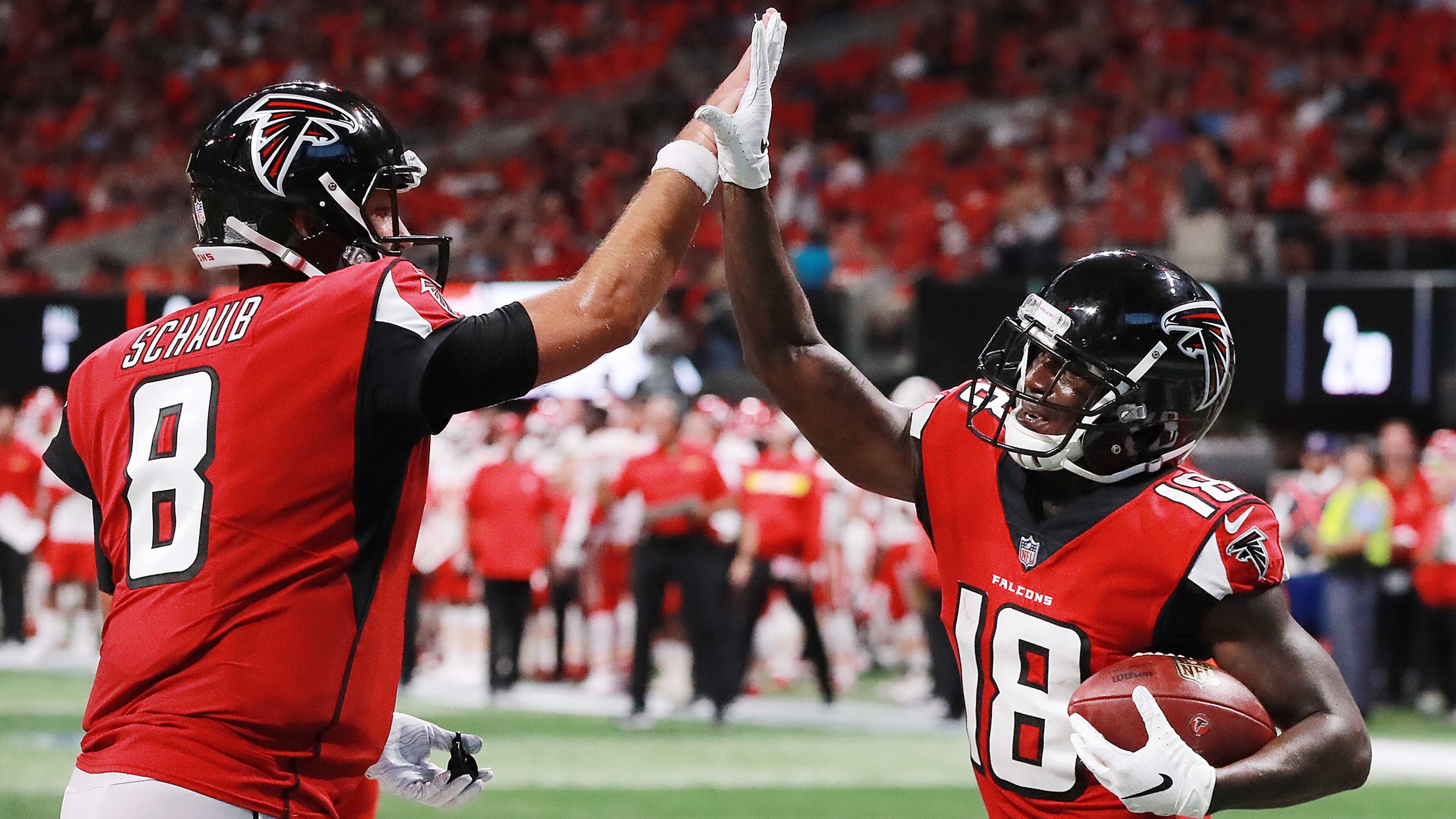 Falcons first-round draft pick Calvin Ridley gets a high-five from backup quarterback Matt Schaub after hooking up for a touchdown reception for a 14-3 lead over the Chiefs During the second quarter Friday, Aug. 17, 2018, at Mercedes-Benz Stadium in Atlanta.