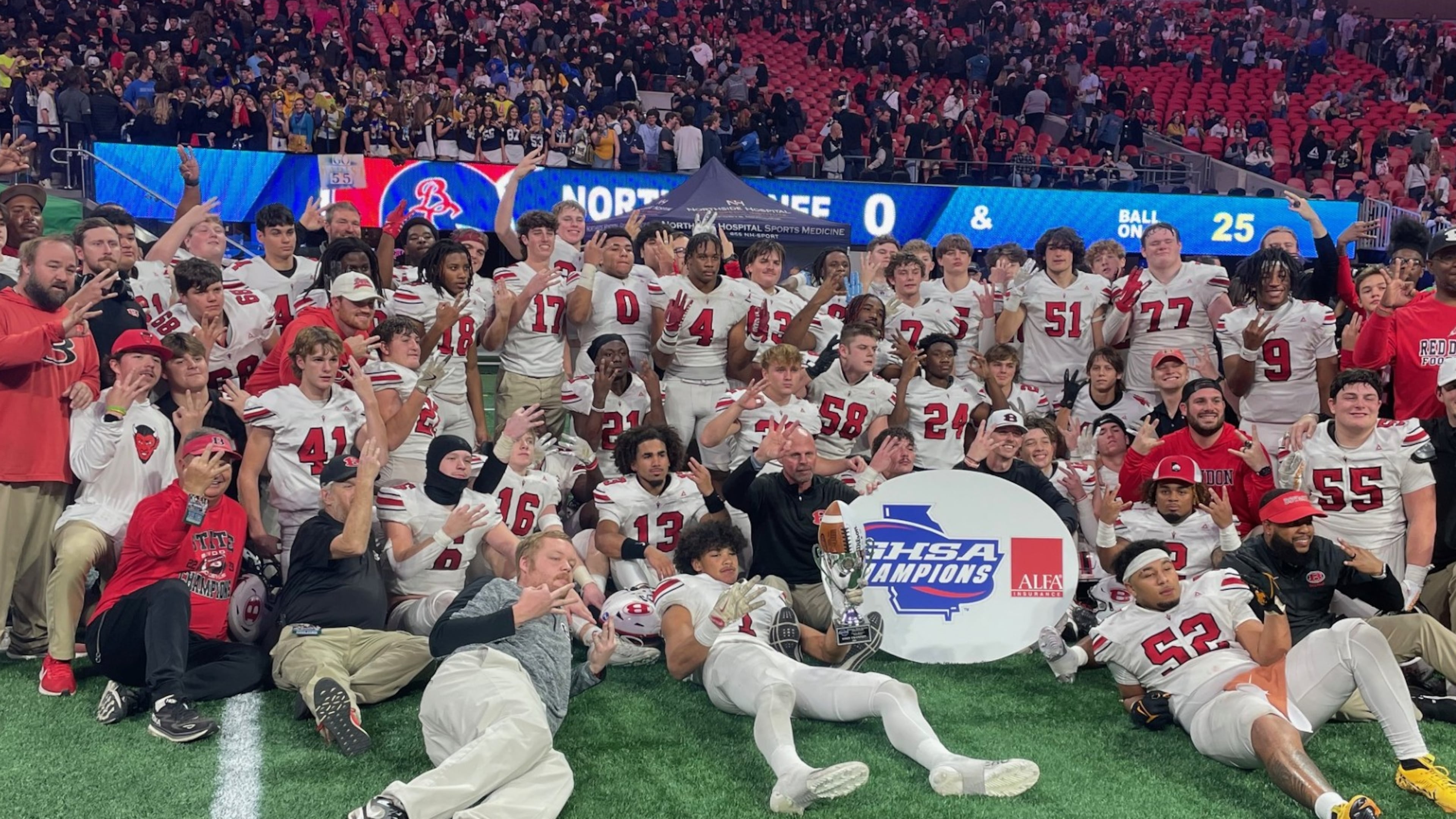 Bowdon players and coaches celebrate their victory over Brooks County in the Class A Division II championship game at Mercedes-Benz Stadium on Monday, Dec. 16, 2024, in Atlanta. Bowdon has a chance to become only the fourth team in history to win four straight.