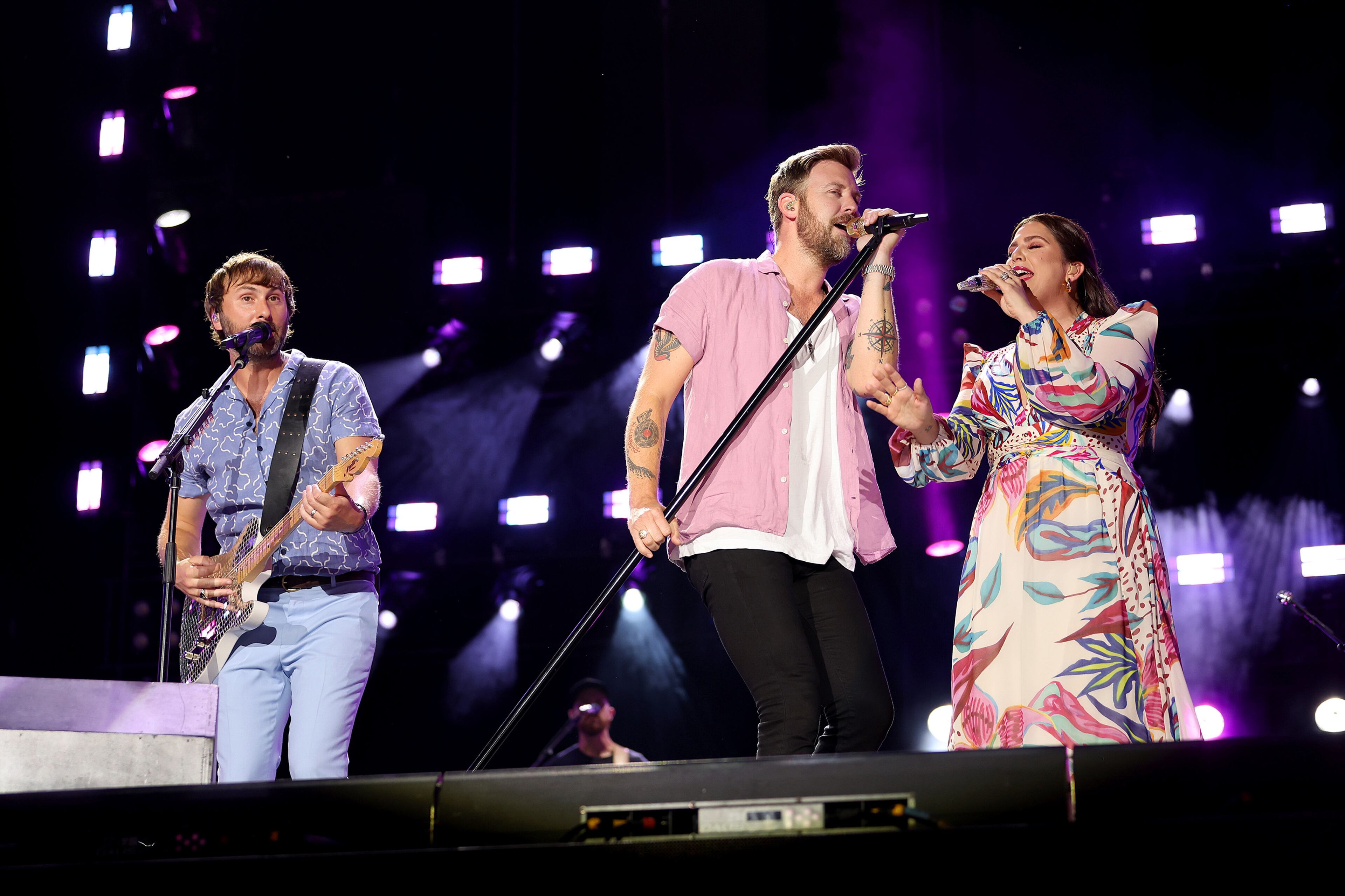 From left, Dave Haywood, Charles Kelley and Hillary Scott of Lady A perform during day four of CMA Fest 2022 at Nissan Stadium on June 12, 2022, in Nashville, Tennessee. (Jason Kempin/Getty Images/TNS)