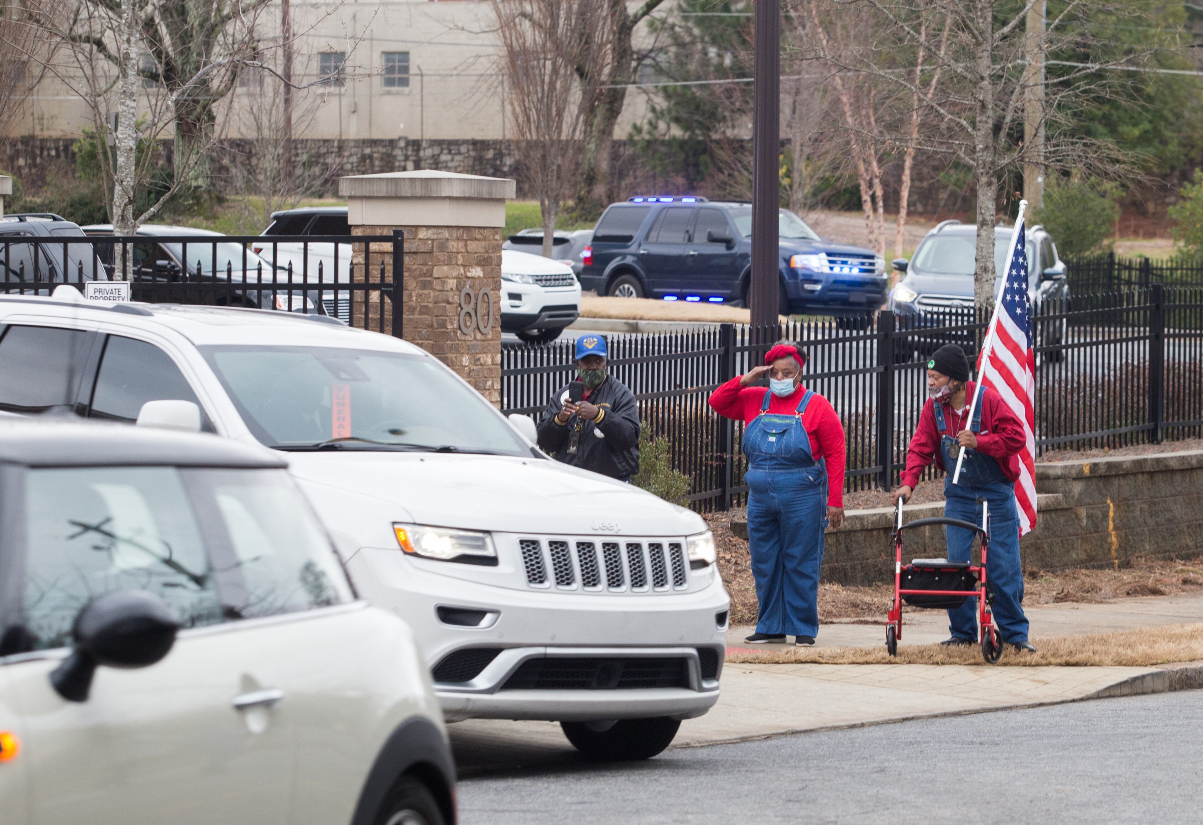 SCLC DeKalb members pay respect as the procession for baseball legend Hank Aaron begins Wednesday, Jan 27, 2021 at Friendship Baptist Church in Atlanta. (Jenni Girtman for The Atlanta Journal-Constitution)
