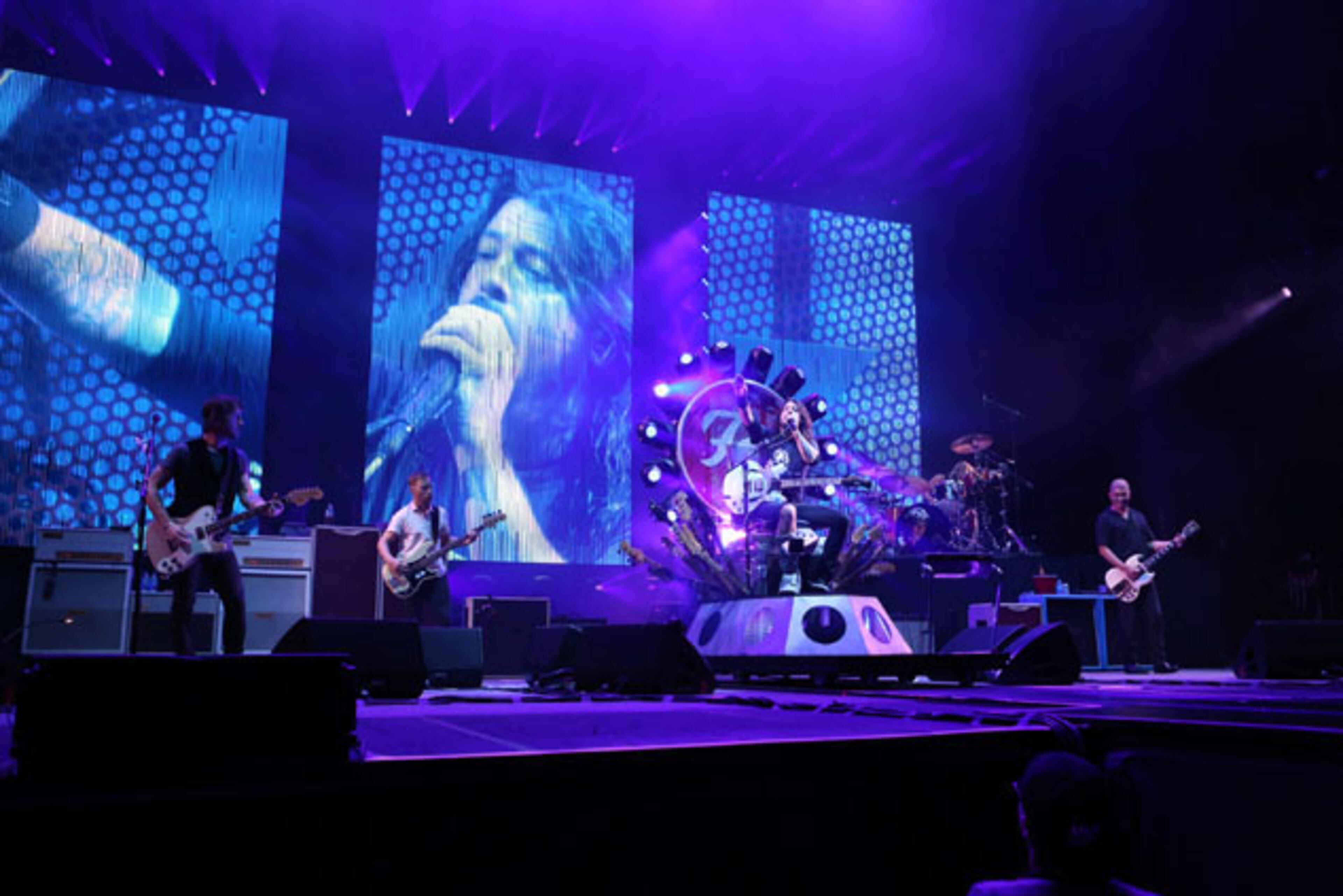 The Foo Fighters perform "Times Like These." Dave Grohl and the Foo Fighters packed over 20,000 fans into sold out Centennial Olympic Park Sunday night, October 4, 2015, with Gary Clark, Jr. opening the show. The light rain couldn't dampen the energy and spirit of the huge crowd. Grohl, who broke his leg while performing in Sweden in June, rocked out in a motorized throne, which was equipped with lights and carried numerous guitars. Robb D. Cohen/ RobbsPhotos.com