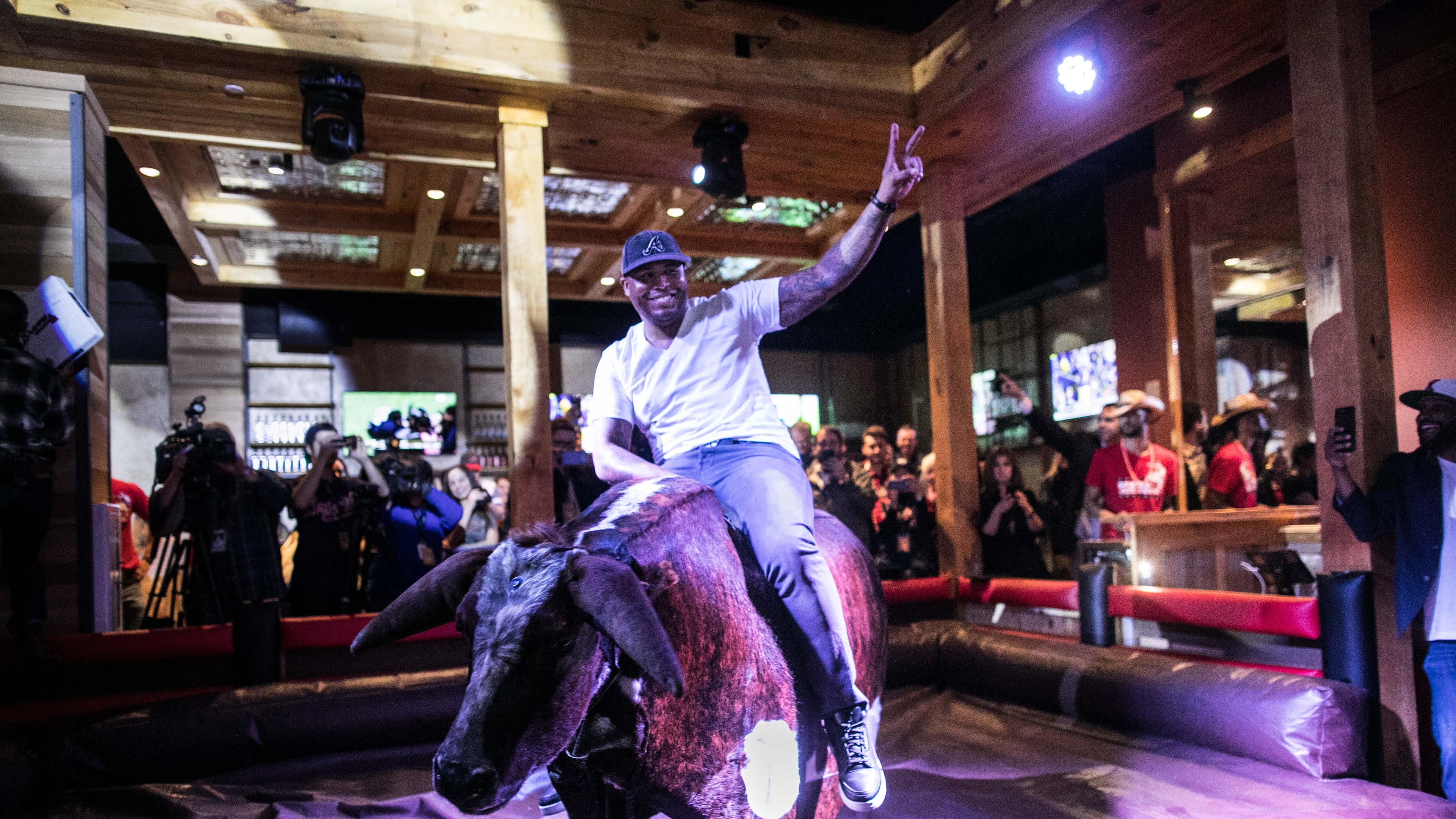 Andruw Jones rides the mechanical bull, "Druw," at PBR Atlanta. Photo credit: Jeff Roffman Photography