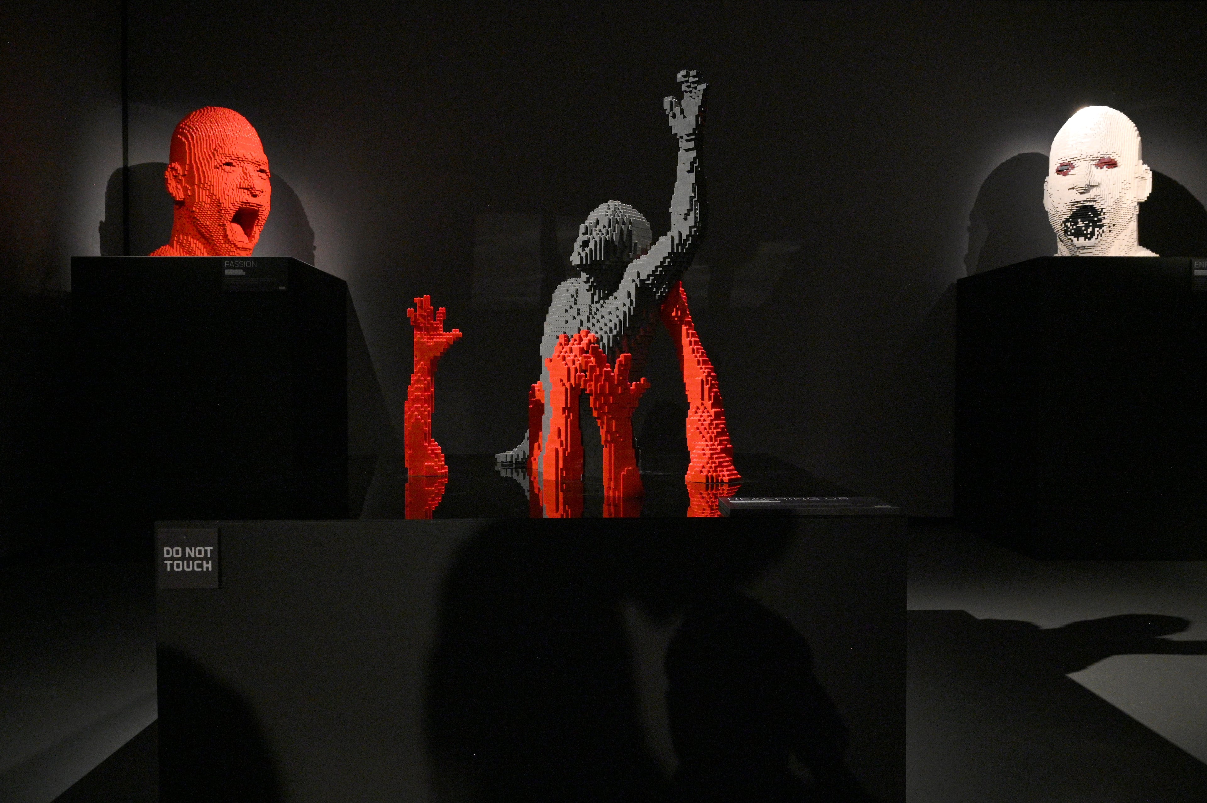 Lego sculptures in “Humanity” room at "Art of the Brick Immersive Experience" exhibition at Exhibition Hub Atlanta Art Centre, Wednesday, April 19, 2023, in Doraville. The exhibition will feature many pieces and themes, including a room with oversized sculptures (25-foot long), over 70 works of art crafted from more than 1 million LEGO bricks, galleries celebrating human-kind and nature, and a short documentary about how Nathan creates his works. (Hyosub Shin / Hyosub.Shin@ajc.com)