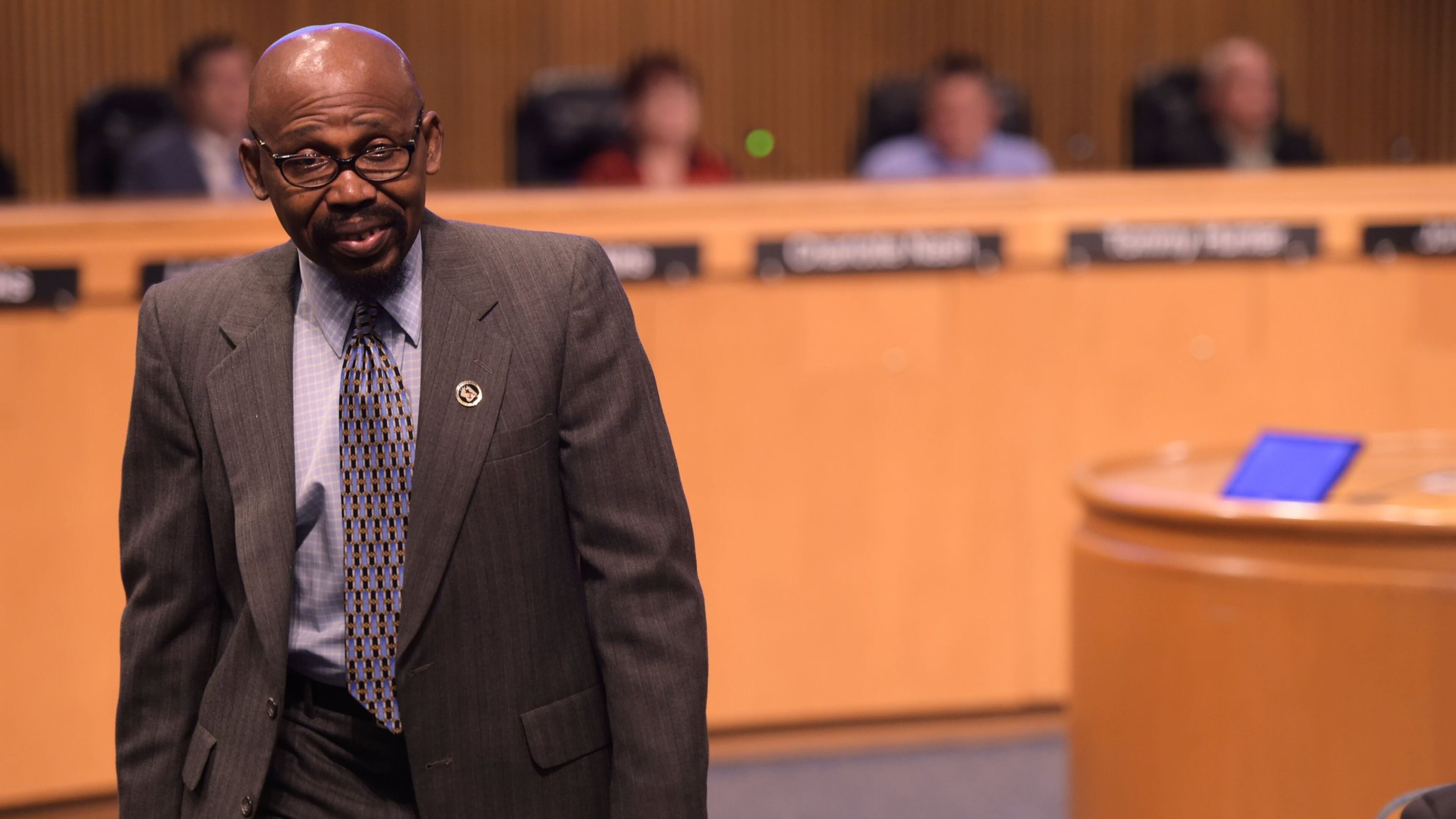 Gabe Okoye, chairman of the Gwinnett County Democratic Party, walks away from the podium after telling the Gwinnett Board of Commissioners that the election to determine the approval of a new contract with MARTA should be held in the upcoming November election instead of being delayed until 2019 on Wednesday, August 1 at the Gwinnett Justice and Administration Center auditorium. JENNA EASON / JENNA.EASON@COXINC.COM