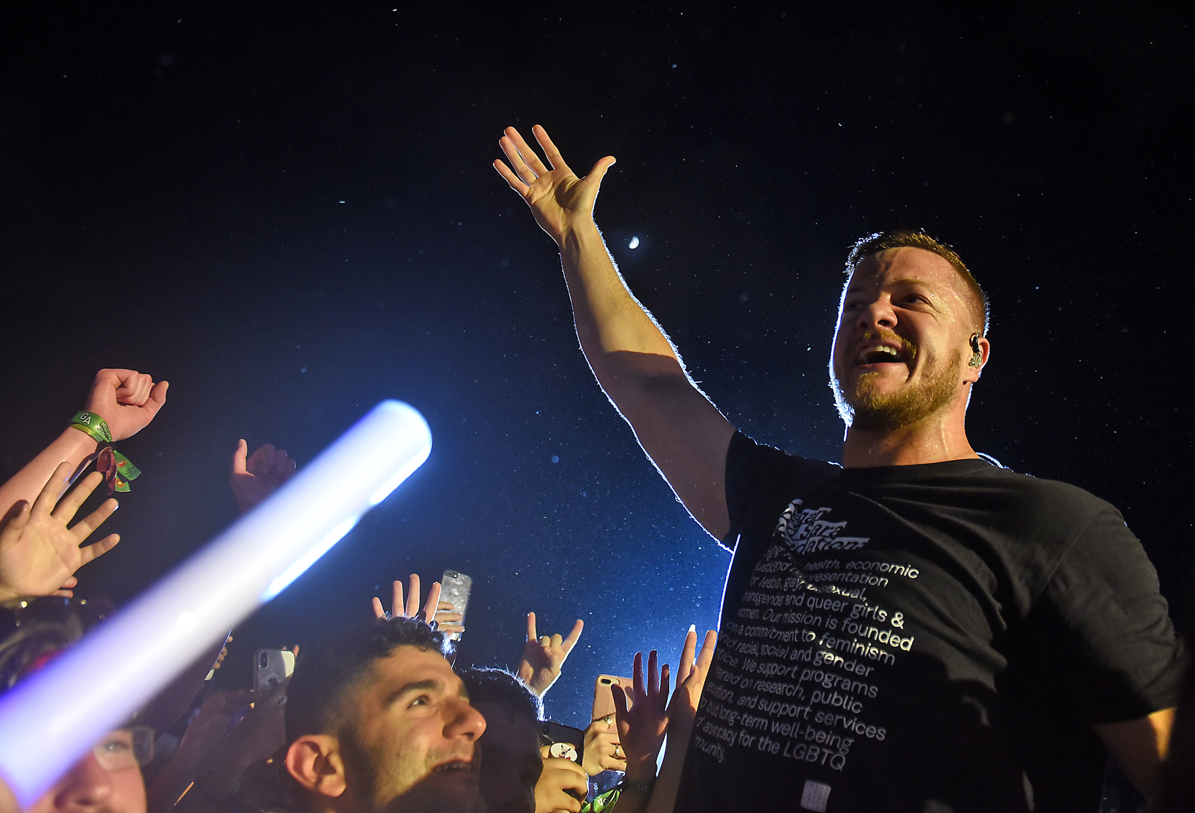 09/16/2018 Atlanta â Dan Reynolds gets close with his audience at Music Midtown. The lead vocalist for Imagine Dragons performed in front of thousands. The two-day event also featured headliner, and Pulitzer Prize winner, Kendrick Lamar. RYON HORNE/RHORNE@AJC.COM