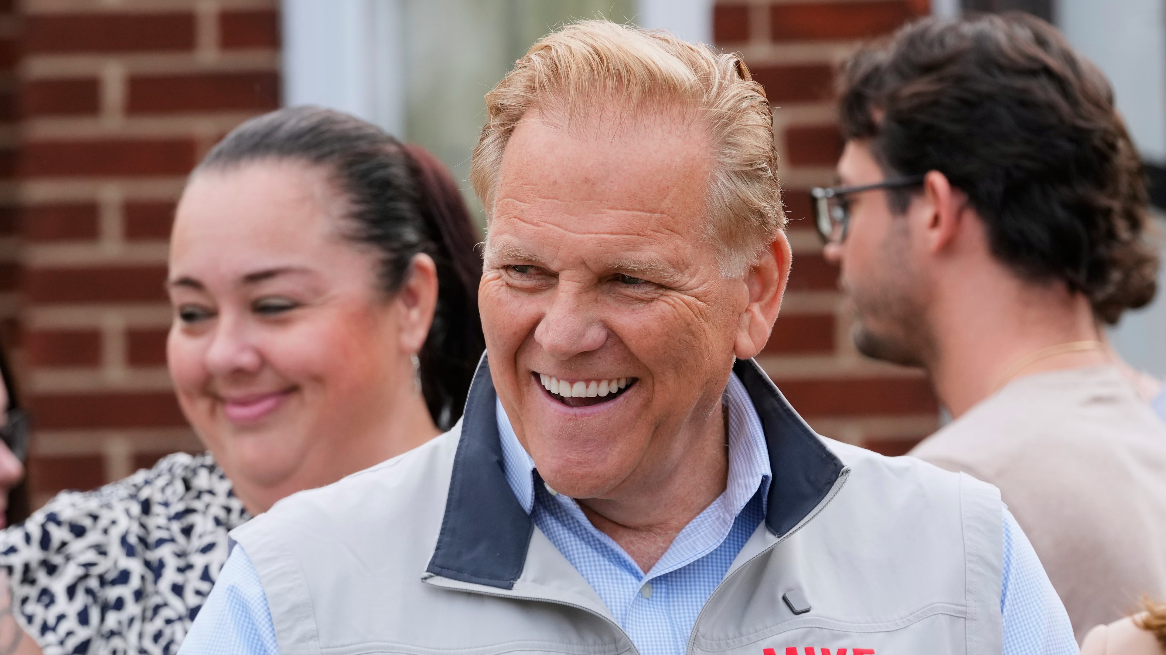 Republican nominee for U.S. Senate Mike Rogers smiles during a campaign event Thursday, Aug. 20, 2026, in Detroit. (AP Photo/Paul Sancya)