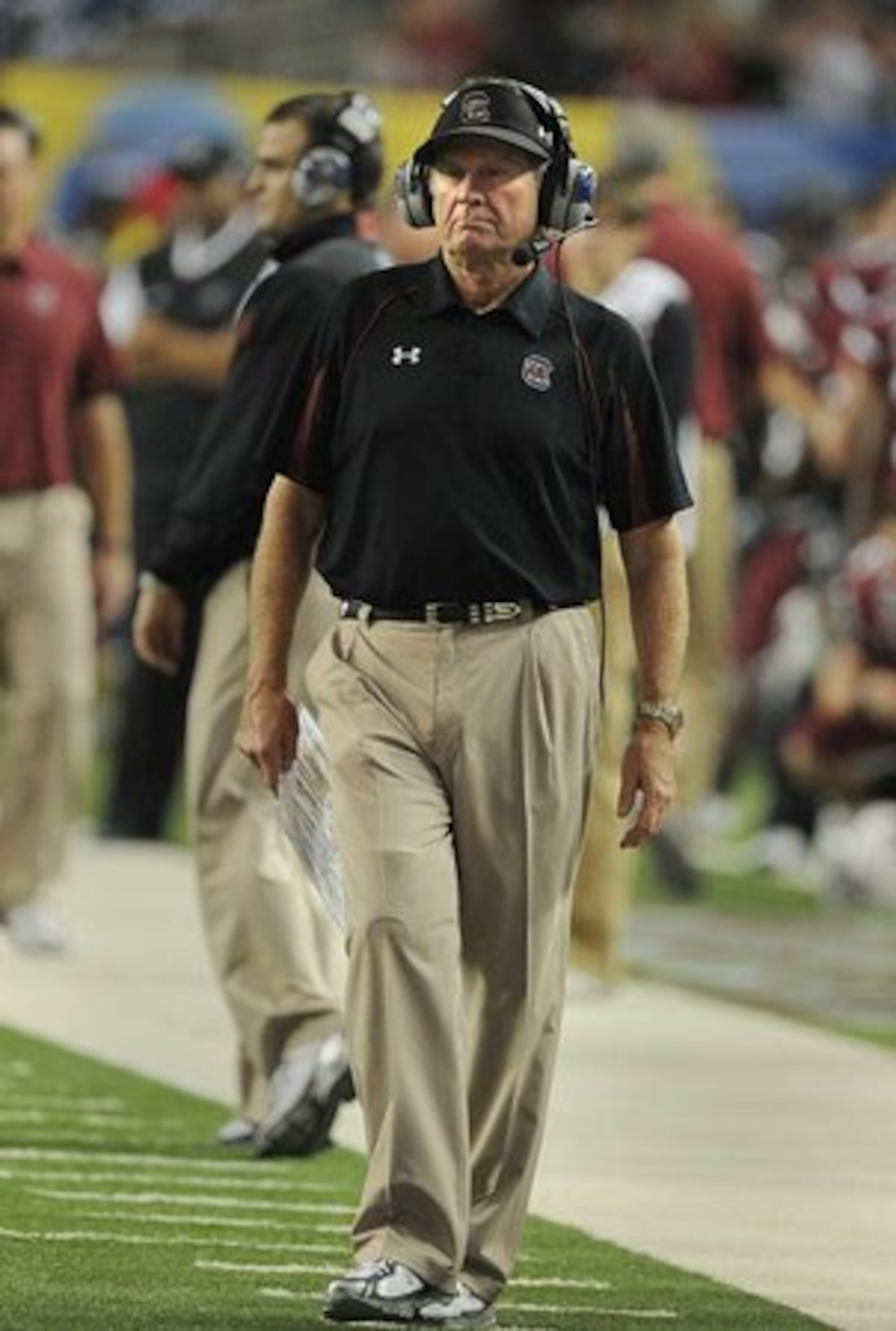 South Carolina coach Steve Spurrier watches from the sideline as his defense gives up yards to Auburn in the SEC Championship game.