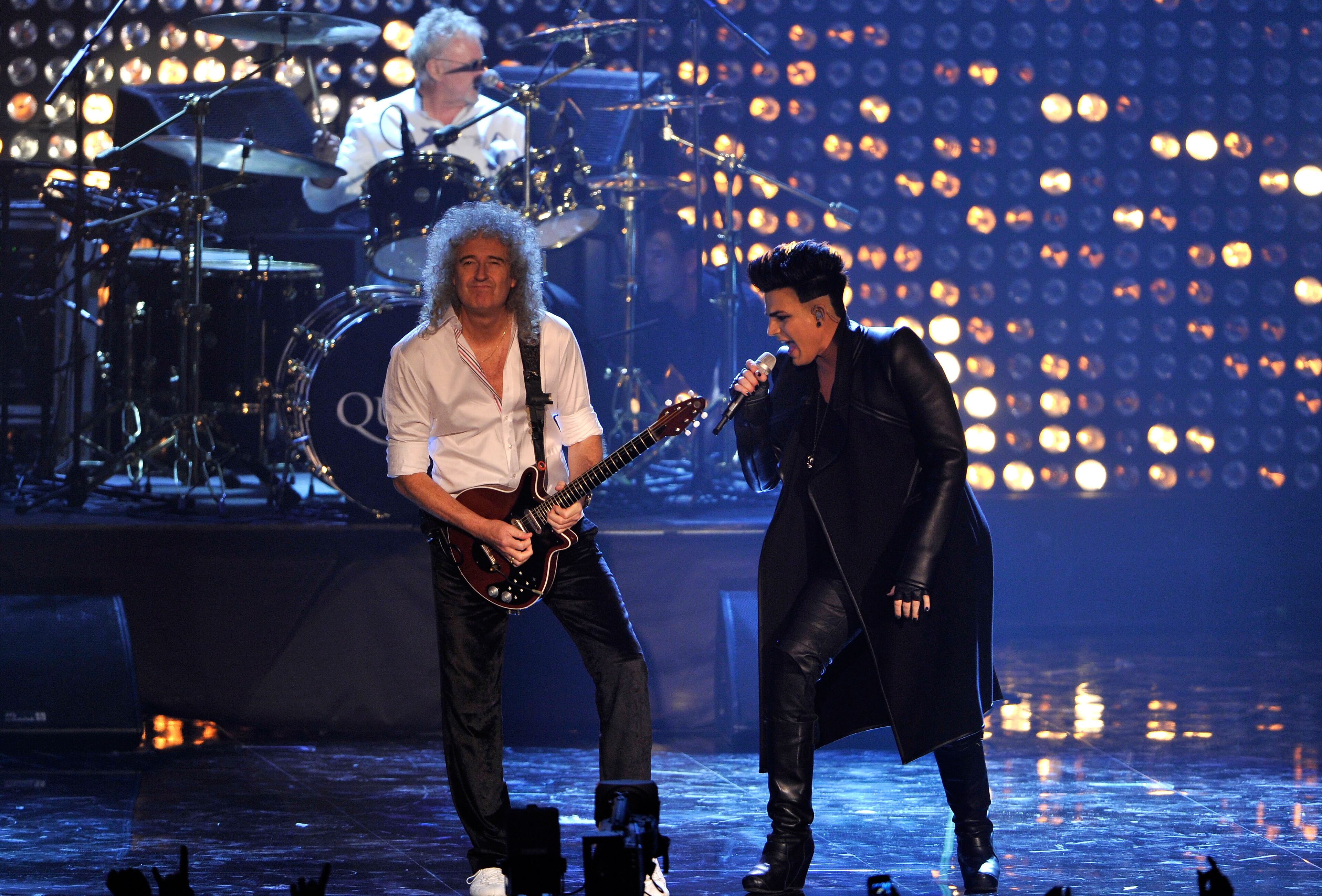 BELFAST, NORTHERN IRELAND - NOVEMBER 06: Brian May of Queen and Adam Lambert perform onstage during the MTV Europe Music Awards 2011 live show at at the Odyssey Arena on November 6, 2011 in Belfast, Northern Ireland. (Photo by Gareth Cattermole/Getty Images)
