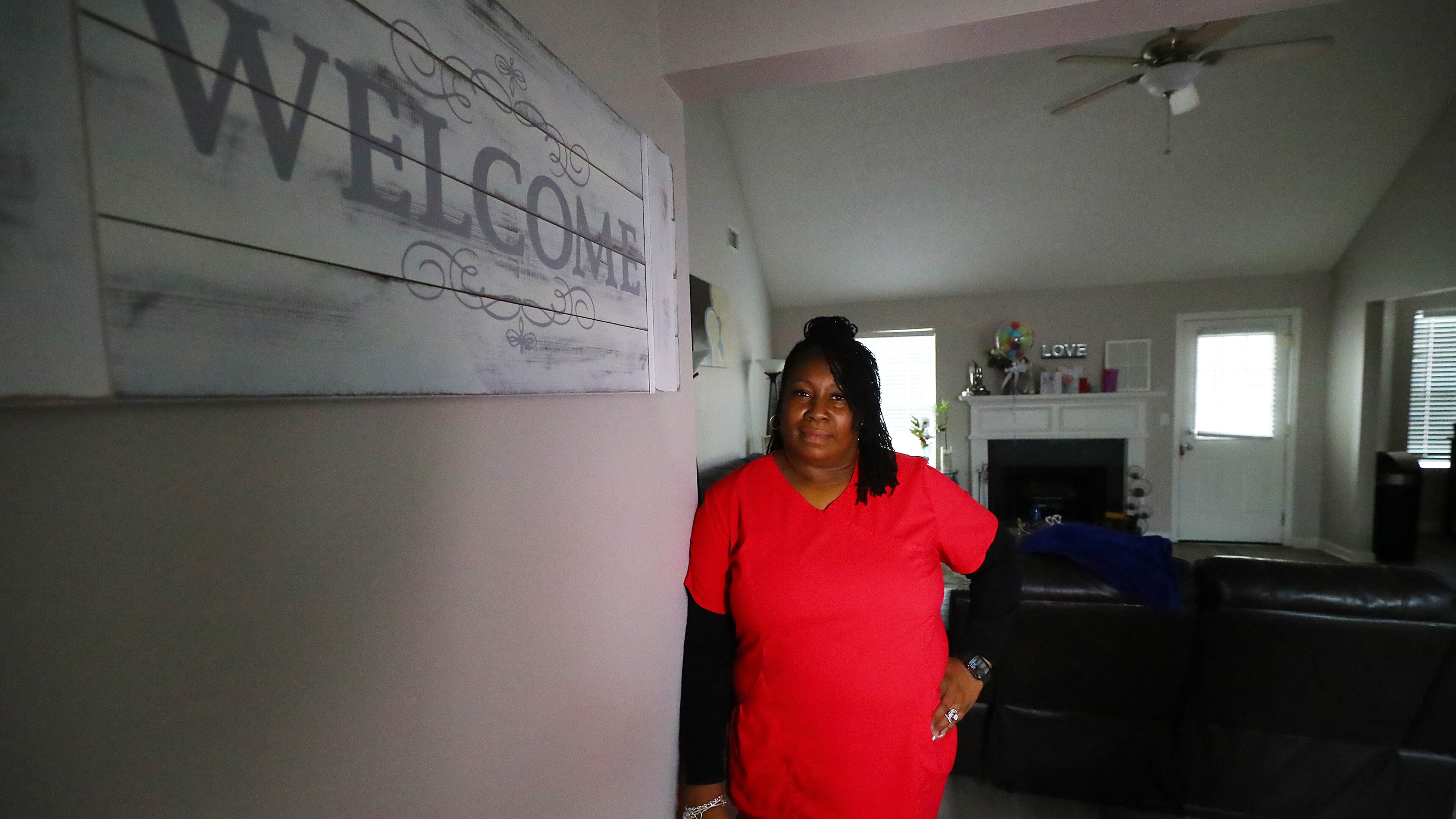 *** VISUAL LEDE *** 020722 SNELLVILLE: Sharanda Hendrickson, a high school nurse, stands in the foyer of her home on Monday, Feb. 7, 2022, in Snellville, discussing how she and her husband had trouble finding housing when their last lease ended in 2020. They are currently renting this home south of Snellville while having to put their dreams of buying a home on hold. Gwinnett leaders face predictions of massive unmet housing demand in Gwinnett County for the next 20 years. “Curtis Compton / Curtis.Compton@ajc.com”`