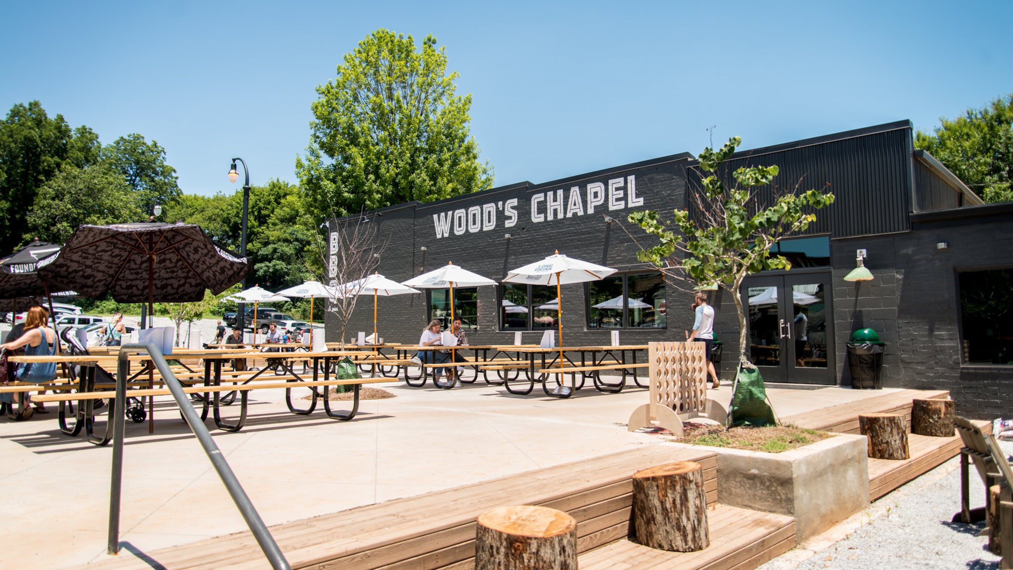 Wood's Chapel BBQ exterior and patio. The restaurant is revamping its menu toward Tex-Mex to keep prices down. (Mia Yakel/Courtesy of Wood's Chapel BBQ).