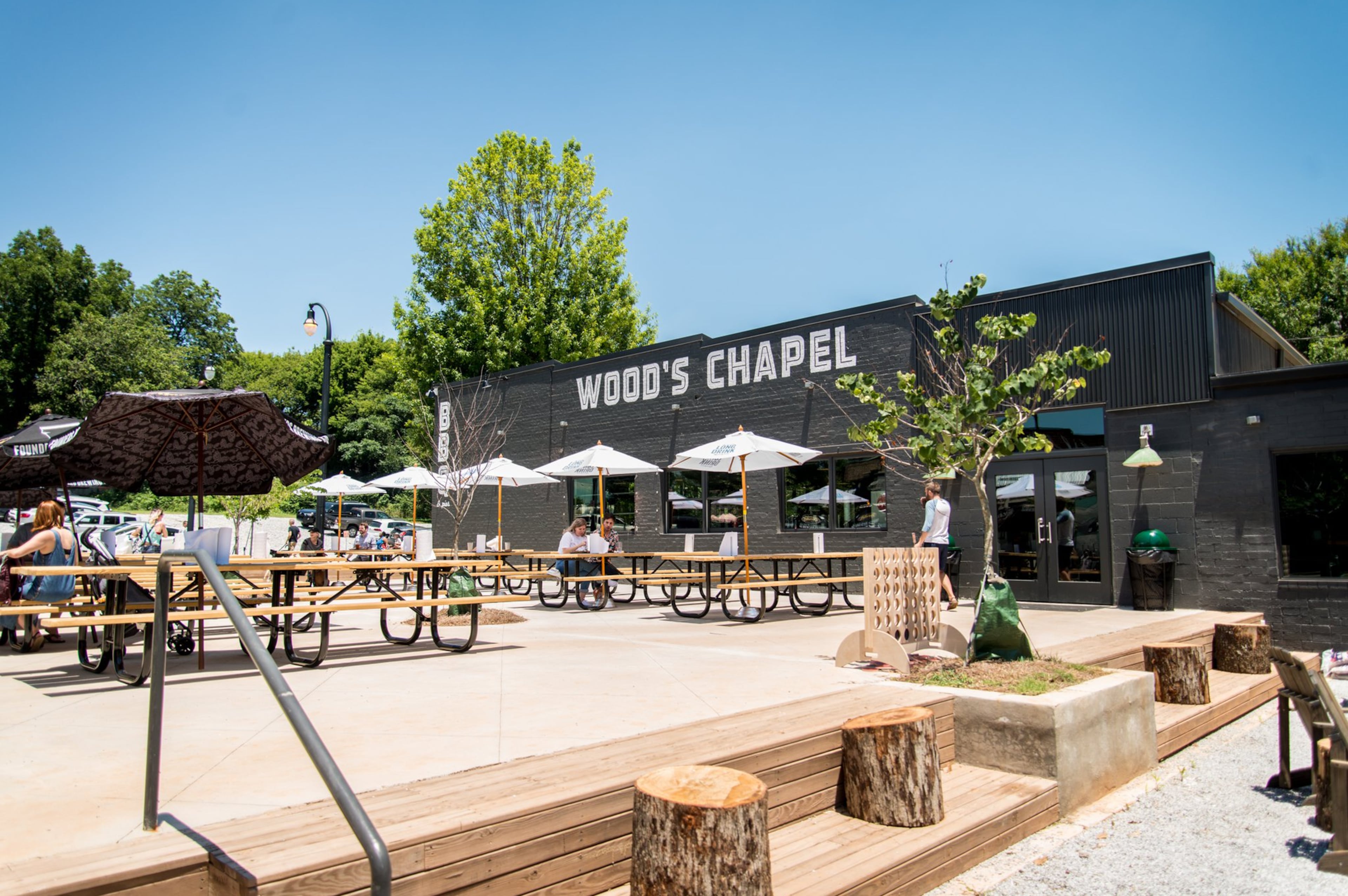 Wood's Chapel BBQ exterior and patio. Photo credit- Mia Yakel.