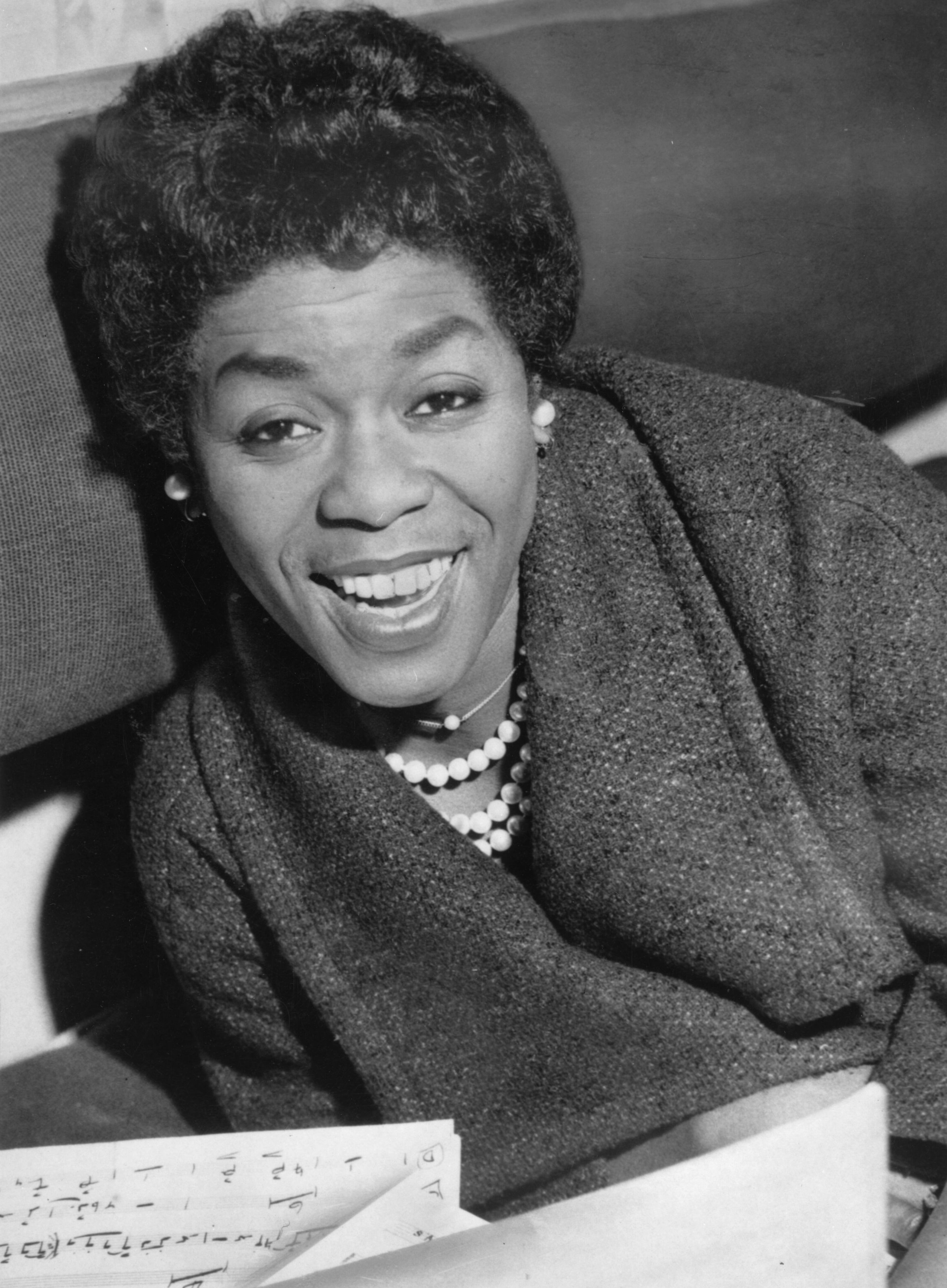 22nd January 1960: American jazz singer and pianist Sarah Lois Vaughan (1924 - 1990), also known as Sassy or The Divine One. She is currently in Britain for a performance at the Royal Albert Hall. (Photo by Terry Disney/Central Press/Getty Images)
