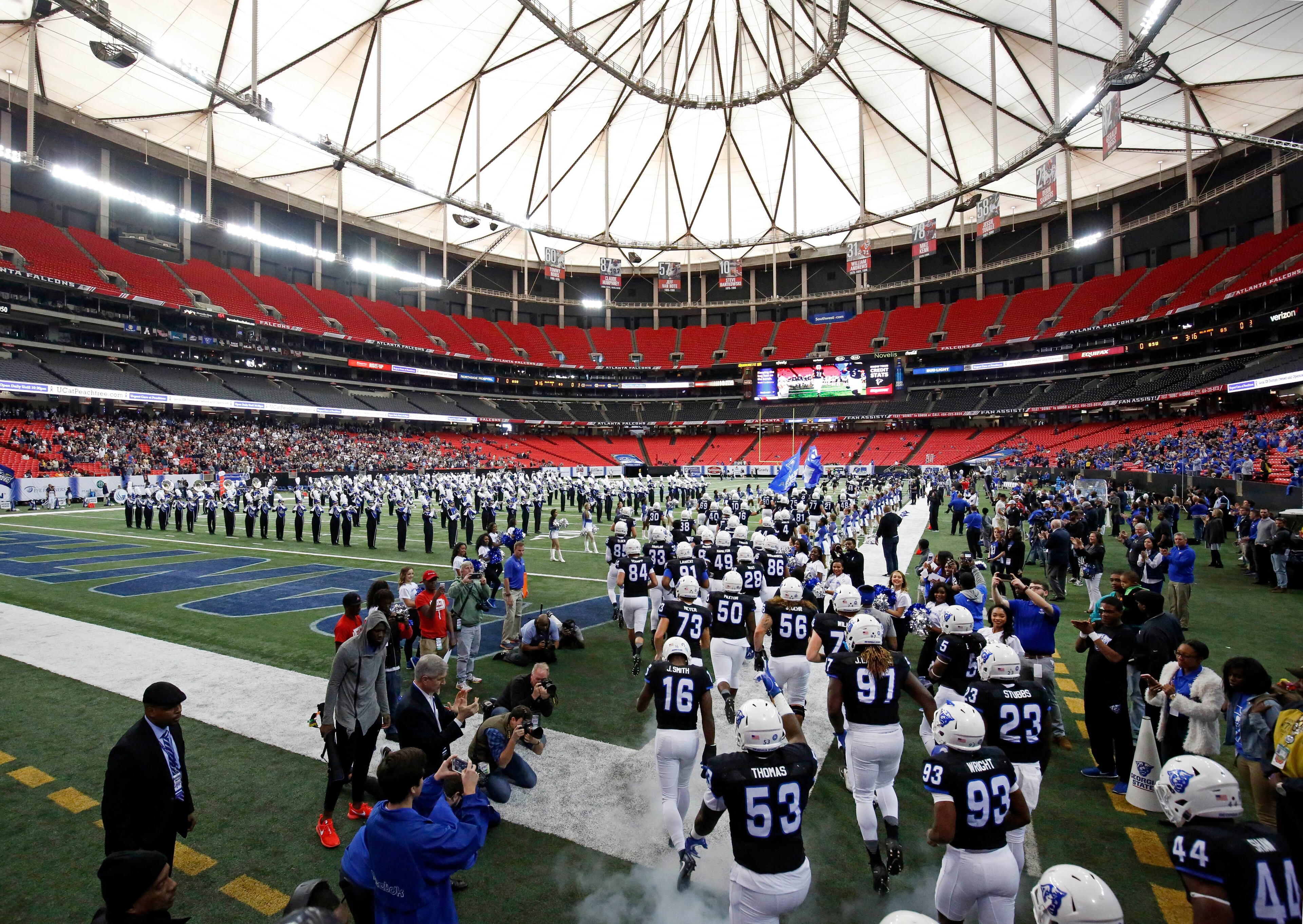 November 19, 2016 - Atlanta, Ga: Georgia State University runs onto the field before their game against Georgia Southern at the Georgia Dome Saturday November 19, 2016, in Atlanta, Ga. PHOTO / JASON GETZ