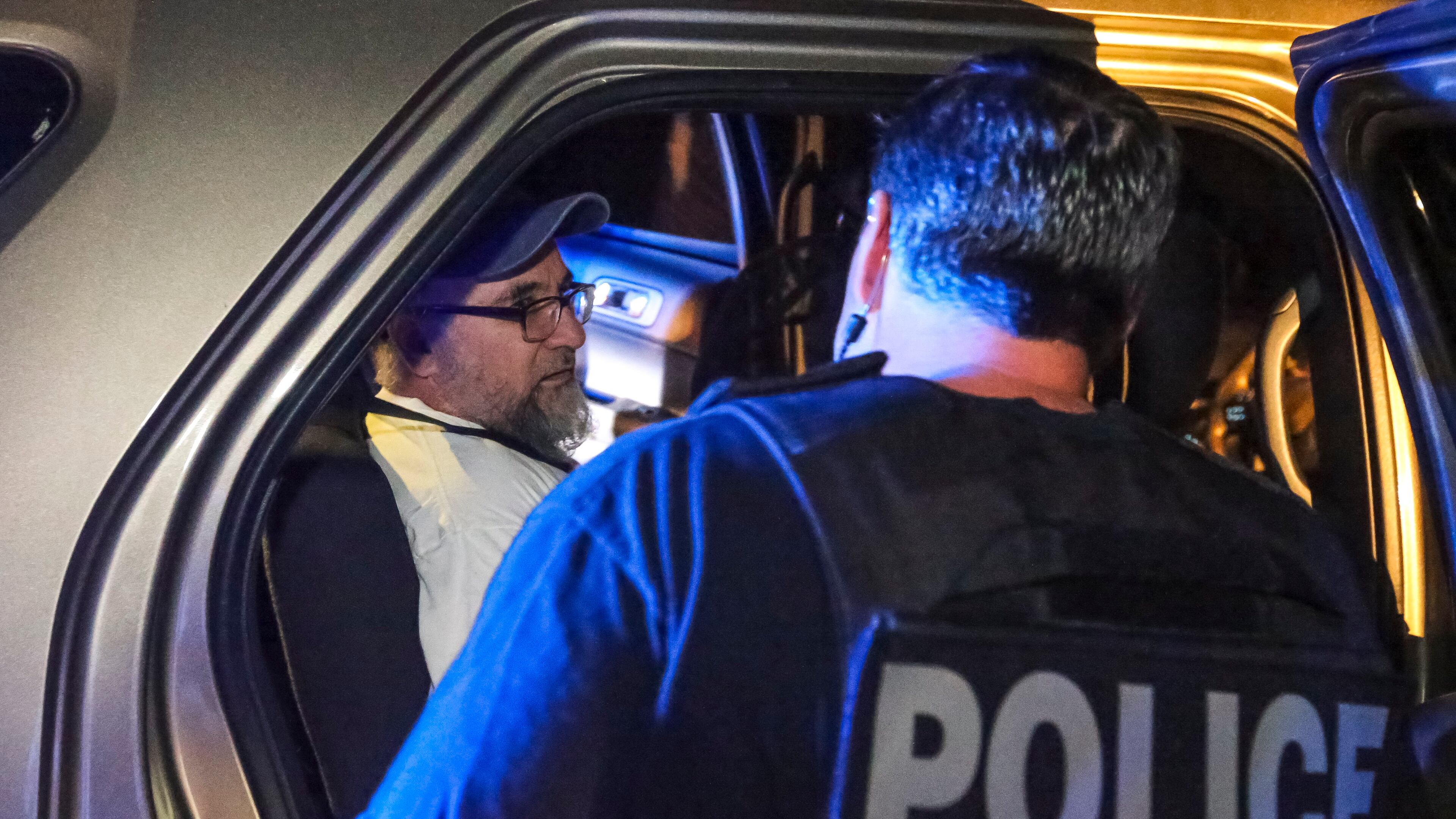 August 18, 2017 Austell: U.S. Immigration and Customs Enforcement officers arrest Jose Serrano (left), a Mexican national with a criminal record, in Austell. JOHN SPINK/JSPINK@AJC.COM