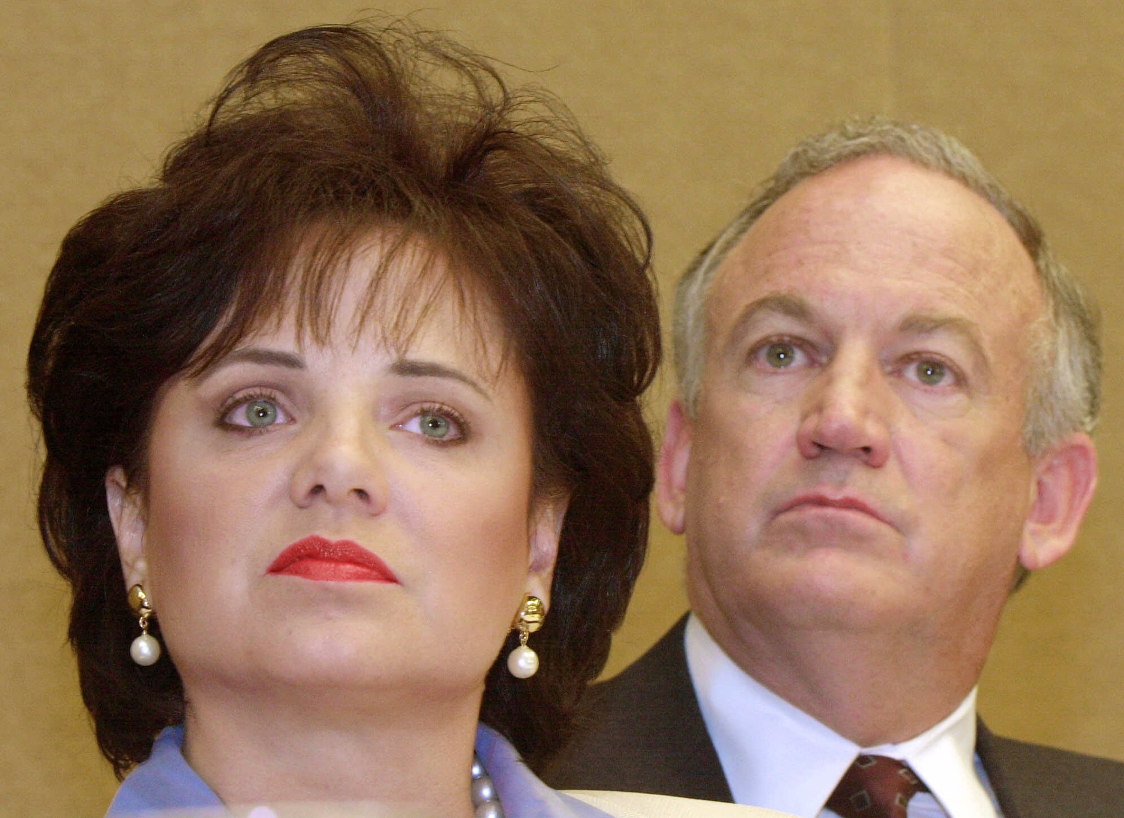 Patsy Ramsey and her husband, John, look on during a news conference in Atlanta in May 2004 in which they discussed their lie-detector examinations in connection with the murder investigation. DNA evidence also indicated their innocence, but they were not finally cleared until 2008.