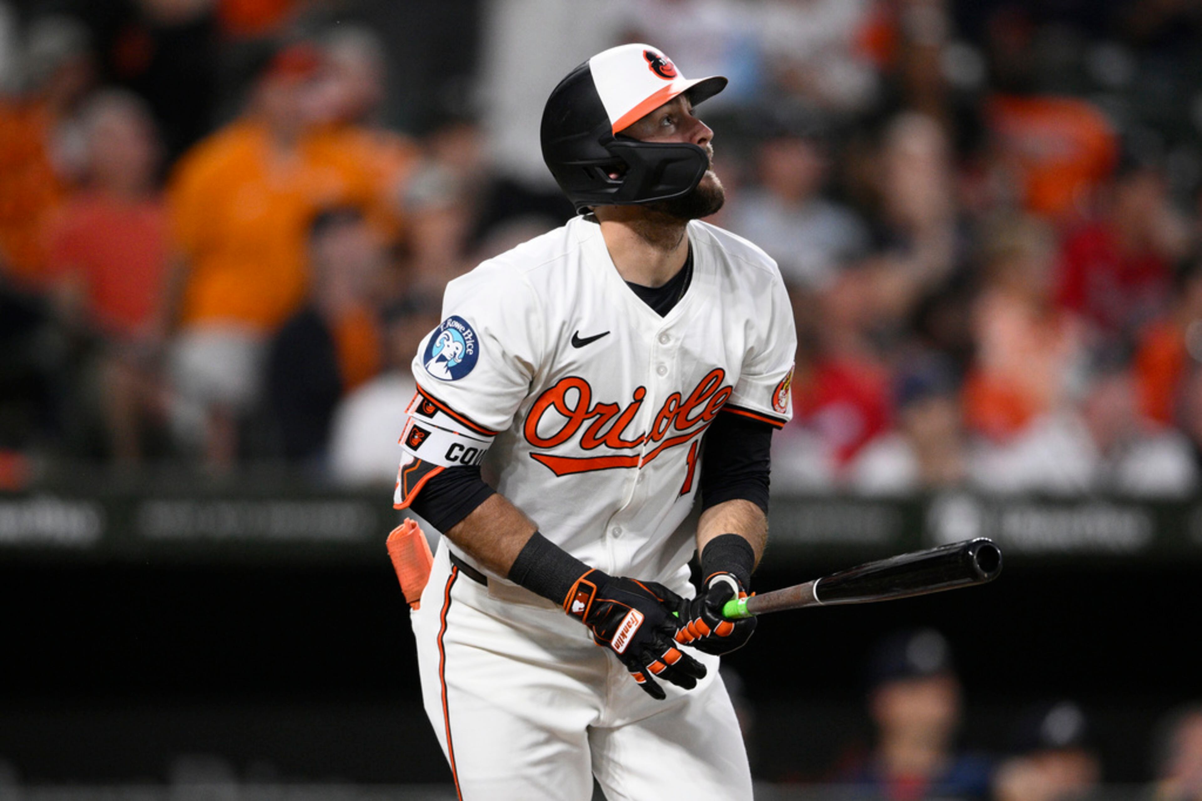 Baltimore Orioles' Colton Cowser watches his two-run home run against the Atlanta Braves during the eighth inning of a baseball game Wednesday, June 12, 2024, in Baltimore. The Orioles won 4-2. (AP Photo/Nick Wass)