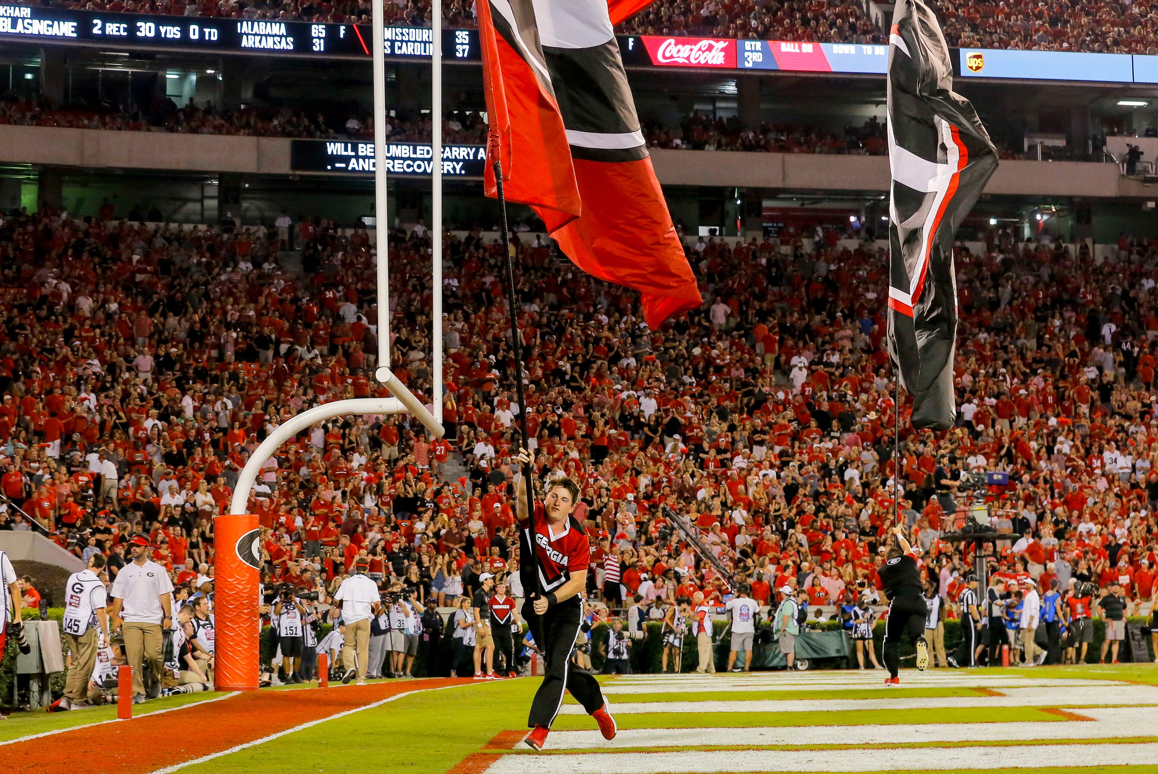 10/06/2018 -- Athens, Georgia -- Georgia cheerleaders celebrate a touchdown by the team during the second half of an NCAA college football game against Vanderbilt at Sanford Stadium in Athens, Saturday, October 6, 2018. The Bulldogs beat Vanderbilt 41-13. (ALYSSA POINTER/ALYSSA.POINTER@AJC.COM)