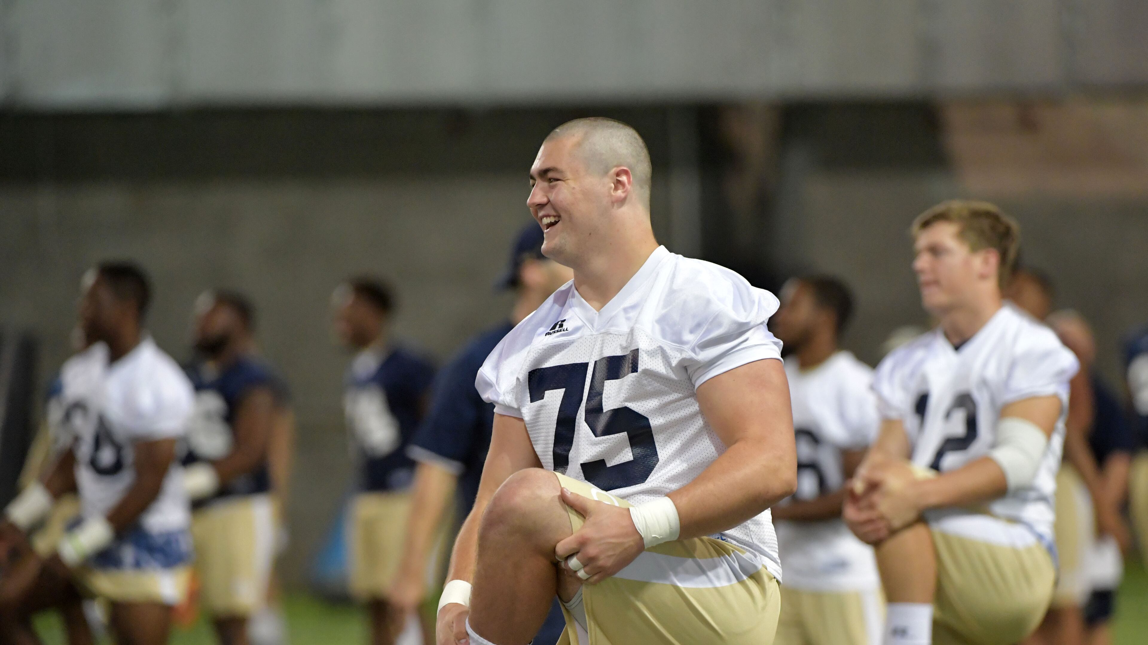 August 4, 2017 Atlanta - Georgia Tech offensive lineman Parker Braun (75) warms up during the first day of Georgia Tech football practice at Rose Bowl Field in Georgia Tech campus on Friday, August 4, 2017. HYOSUB SHIN / HSHIN@AJC.COM